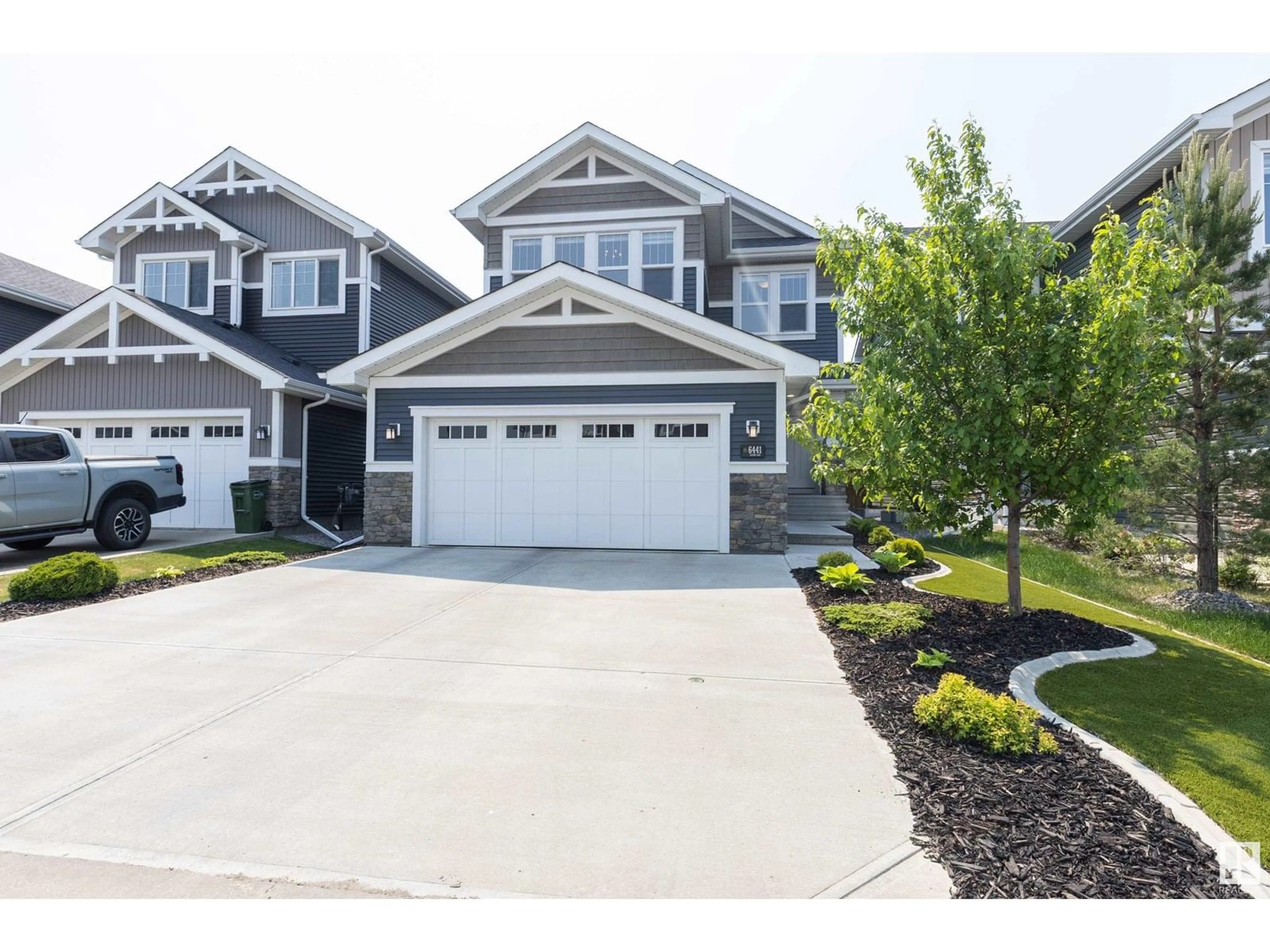 Home with vinyl exterior material, street for NW - 6441 ELSTON LO, Edmonton Alberta T6M0V8