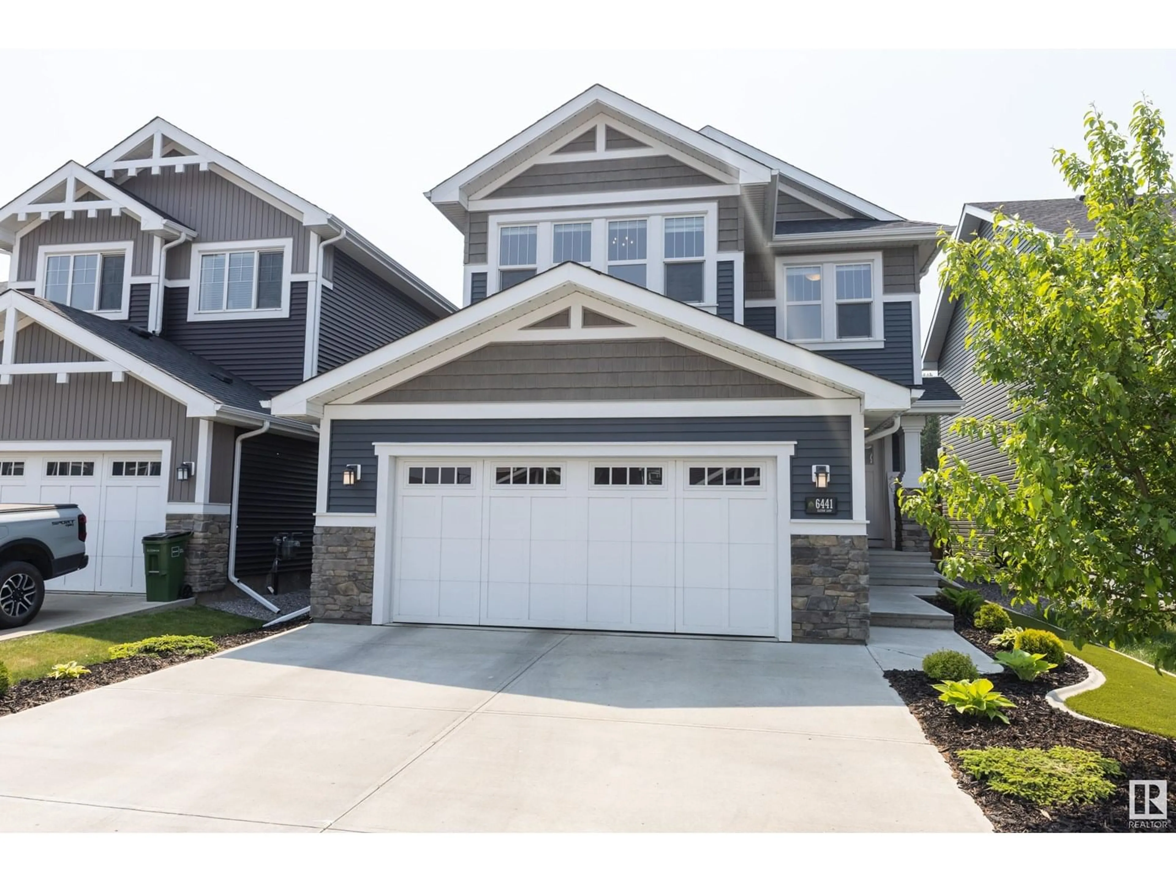 Home with vinyl exterior material, street for NW - 6441 ELSTON LO, Edmonton Alberta T6M0V8