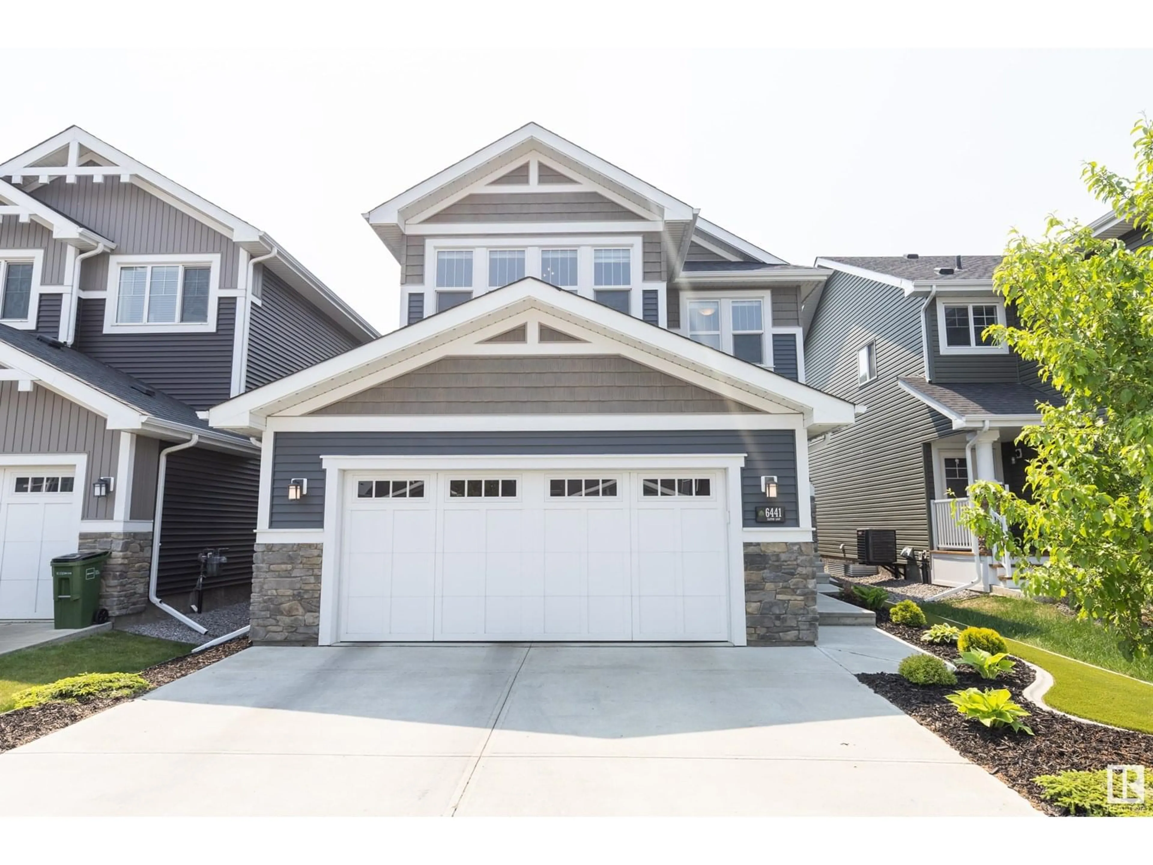 Home with vinyl exterior material, street for NW - 6441 ELSTON LO, Edmonton Alberta T6M0V8