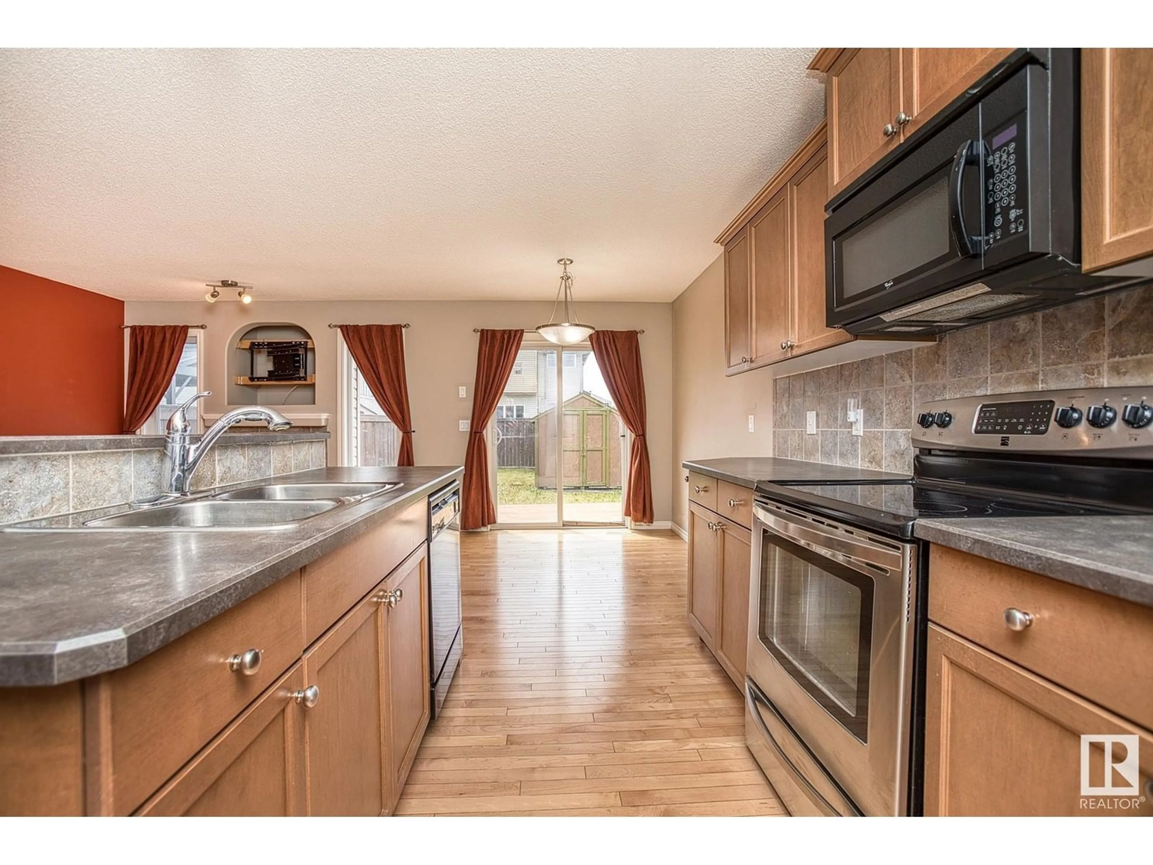Open concept kitchen, unknown for 29 CARAGANA WY, Fort Saskatchewan Alberta T6L0H8