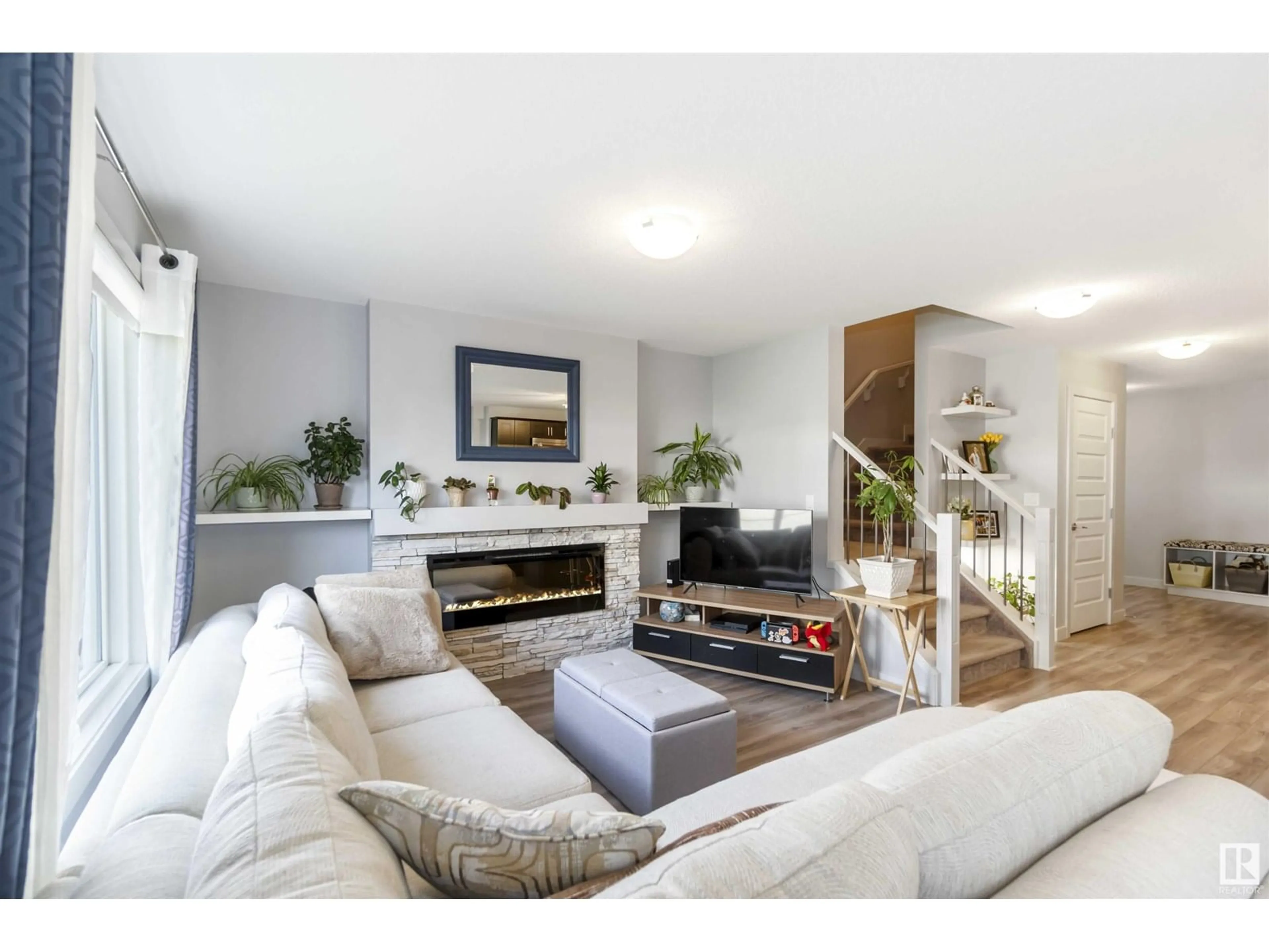 Living room with furniture, unknown for 3657 HUMMINGBIRD WY, Edmonton Alberta T5S0K7