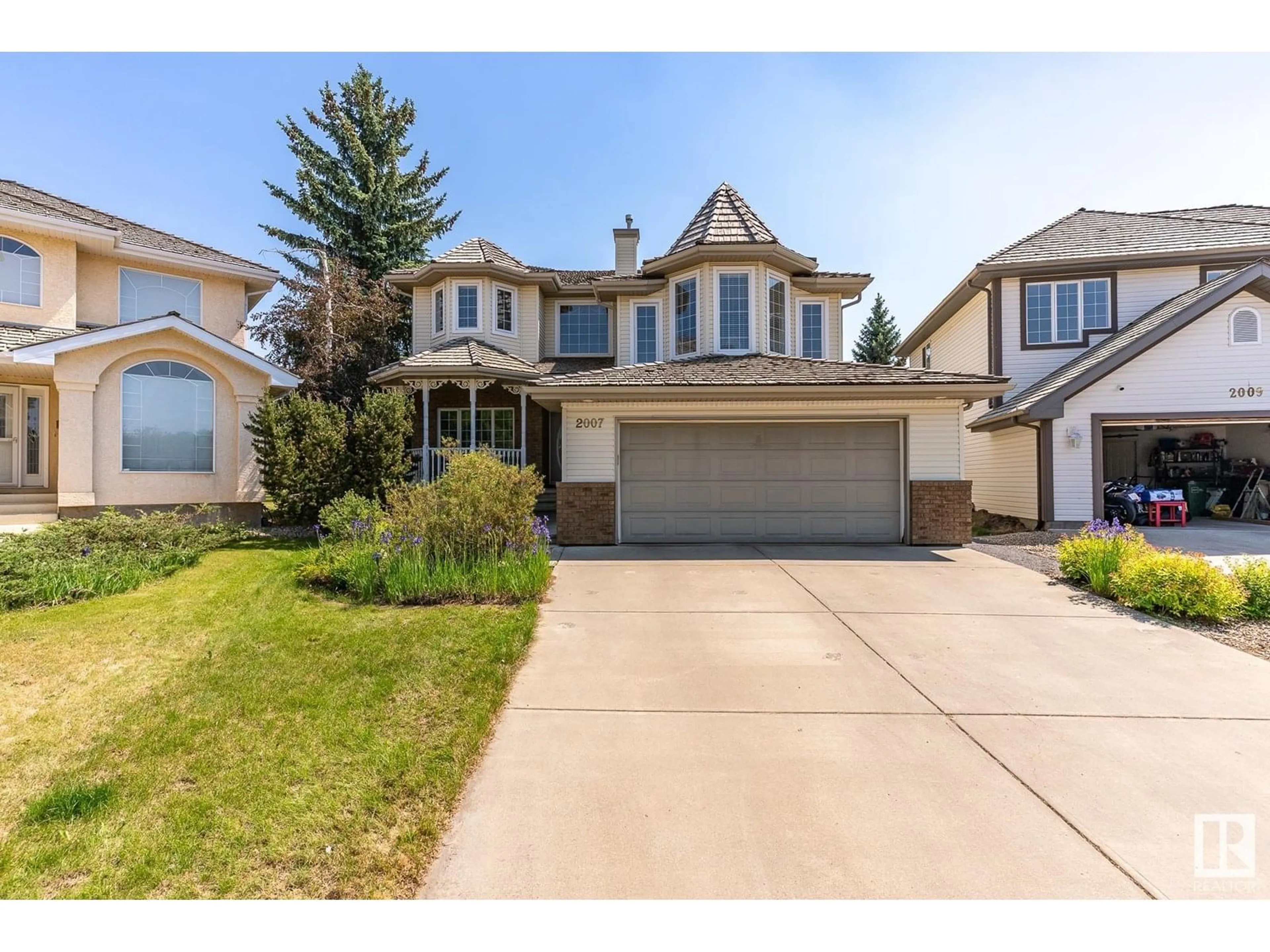 Home with vinyl exterior material, street for 2007 HADDOW DR, Edmonton Alberta T6R2P2