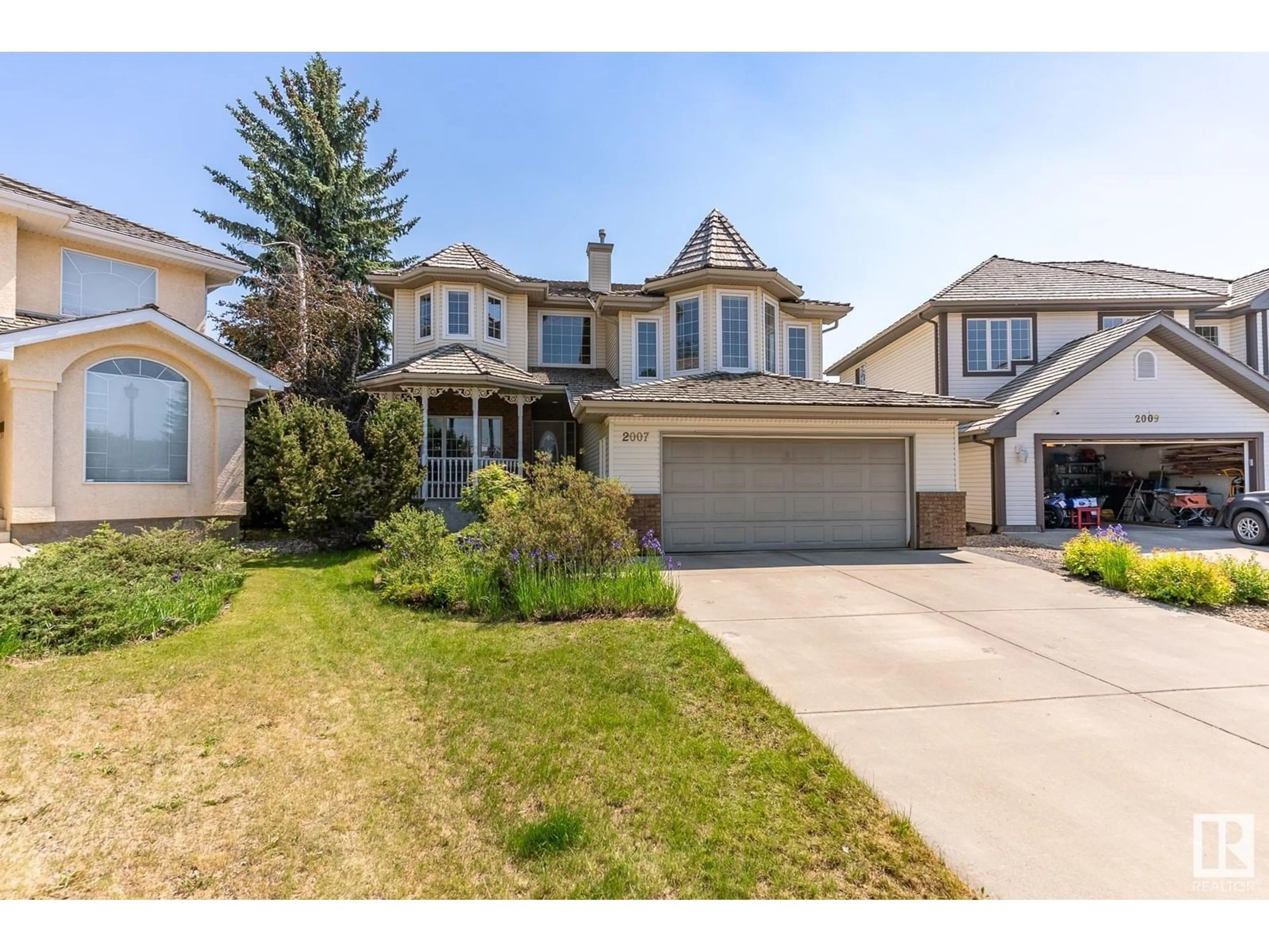 Home with vinyl exterior material, street for 2007 HADDOW DR, Edmonton Alberta T6R2P2