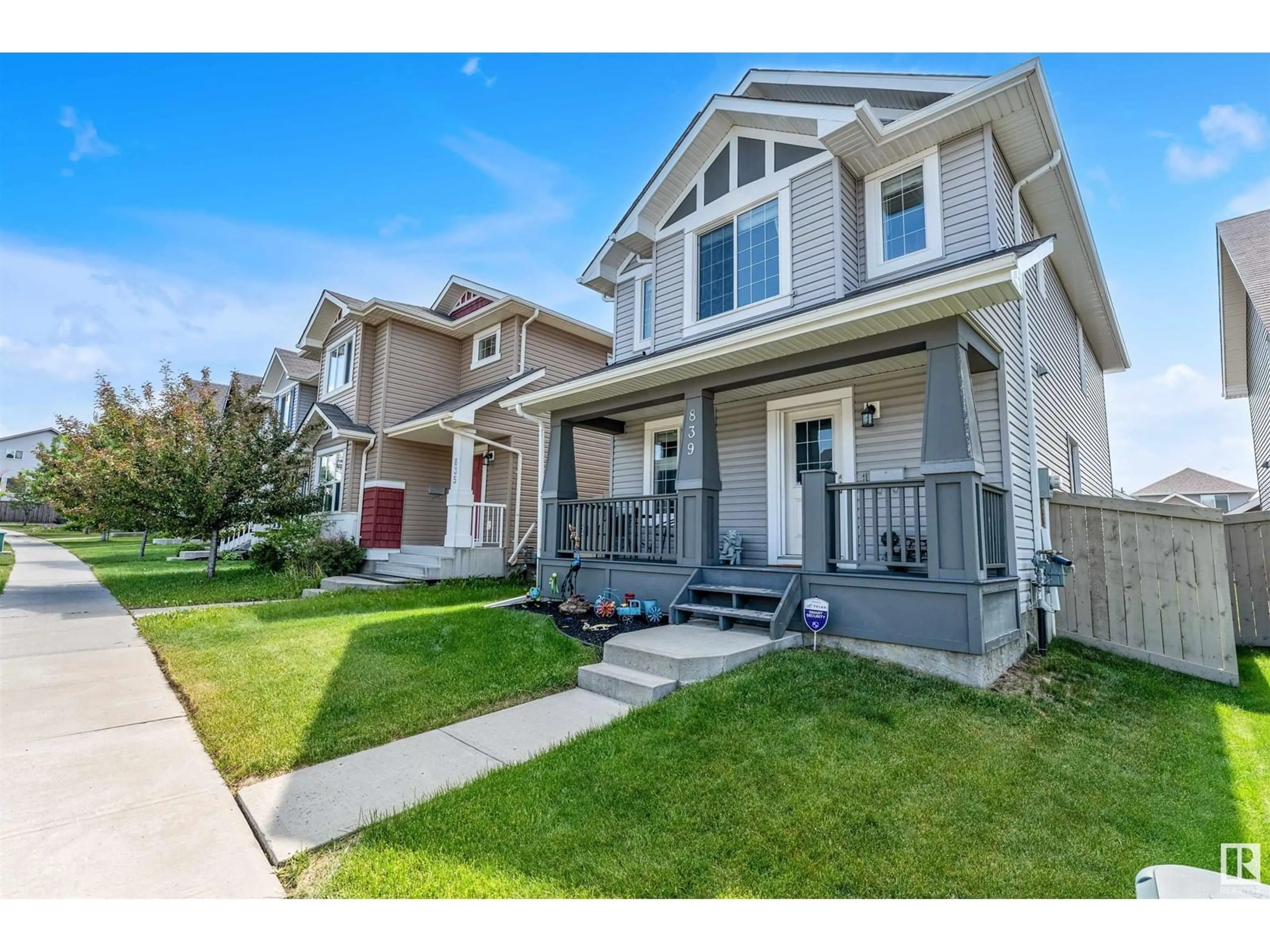 Home with vinyl exterior material, street for 839 37 AVE AV, Edmonton Alberta T6T0S3