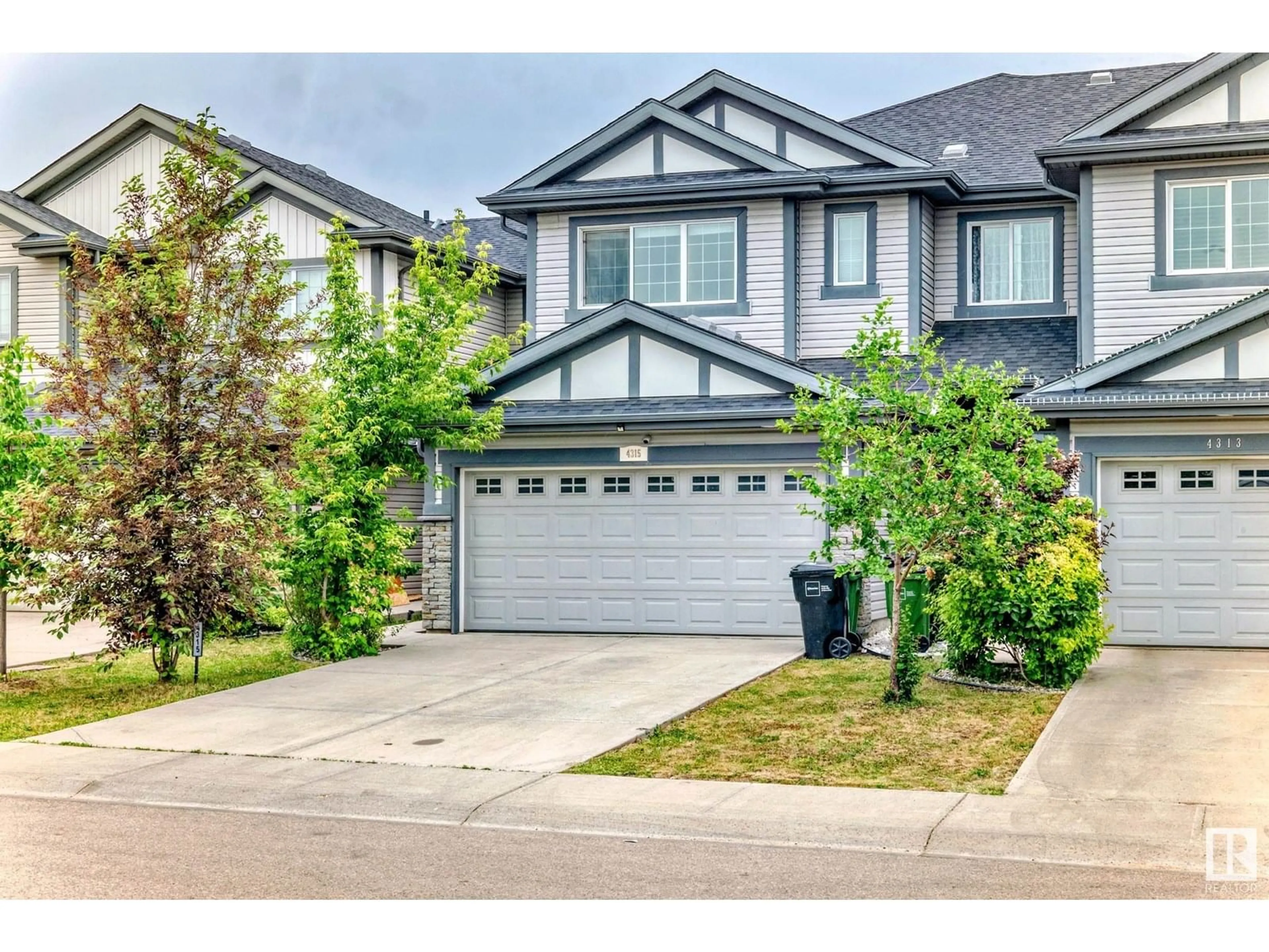 Home with vinyl exterior material, street for SW - 4315 ANNETT CM, Edmonton Alberta T6W2V5