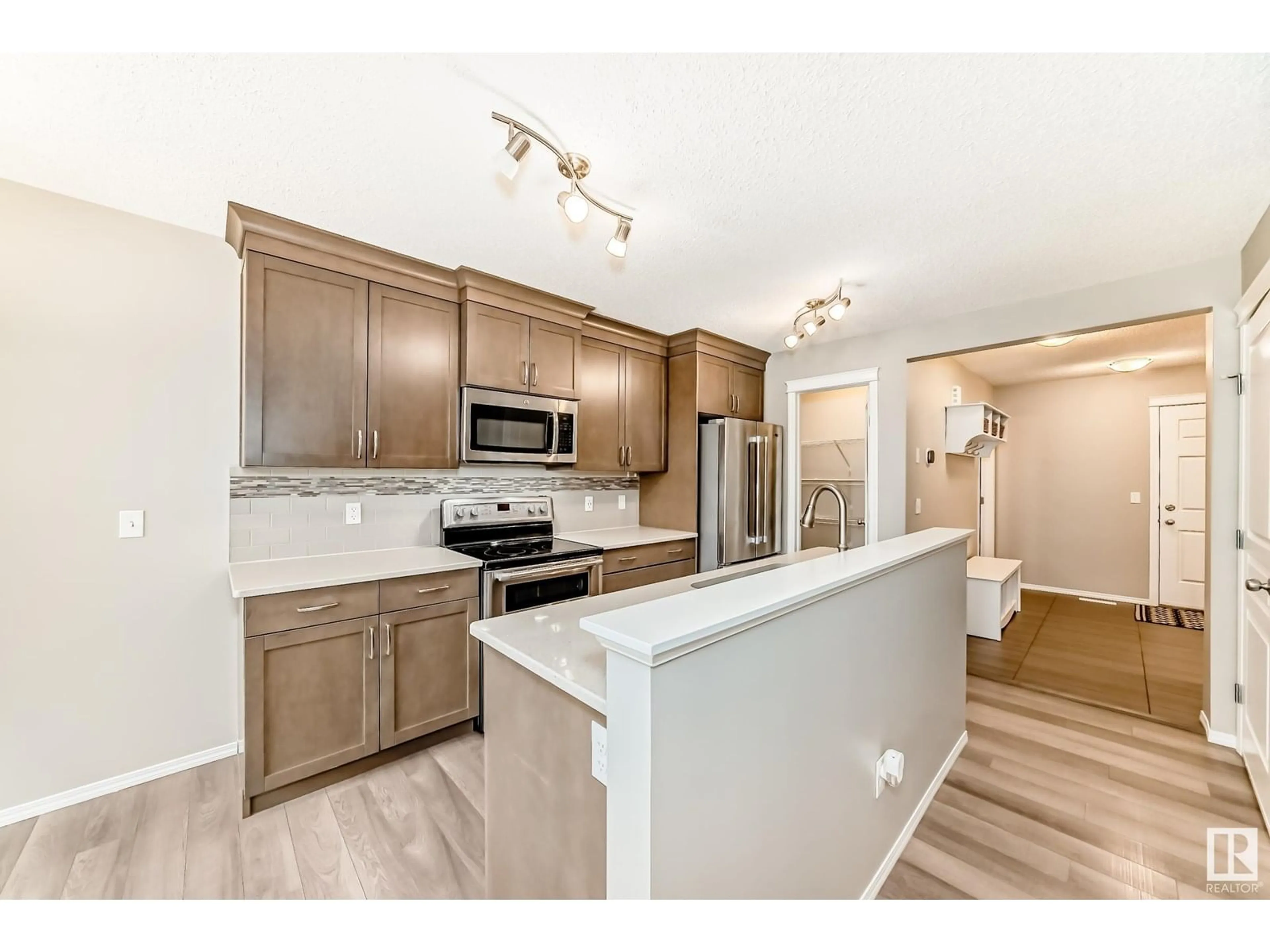 Open concept kitchen, unknown for SW - 4315 ANNETT CM, Edmonton Alberta T6W2V5