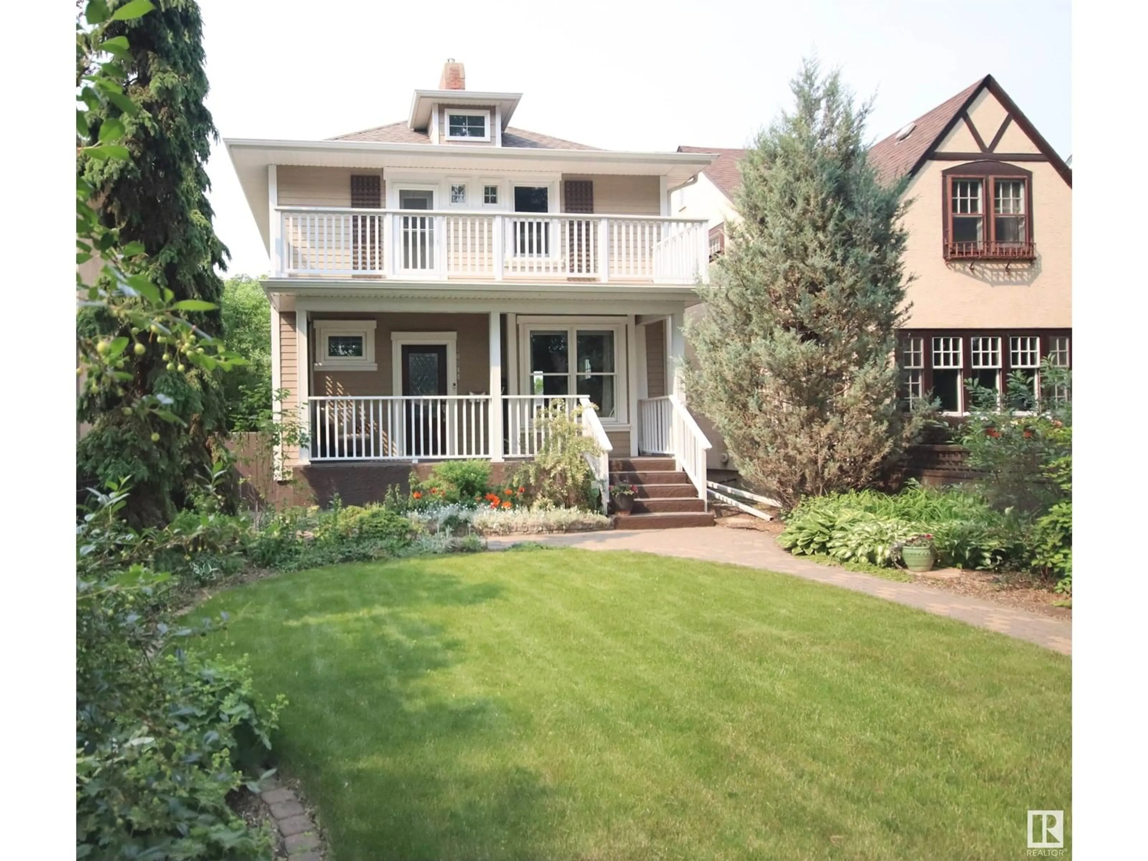 Home with vinyl exterior material, street for 10944 89 AV, Edmonton Alberta T6G0Z5