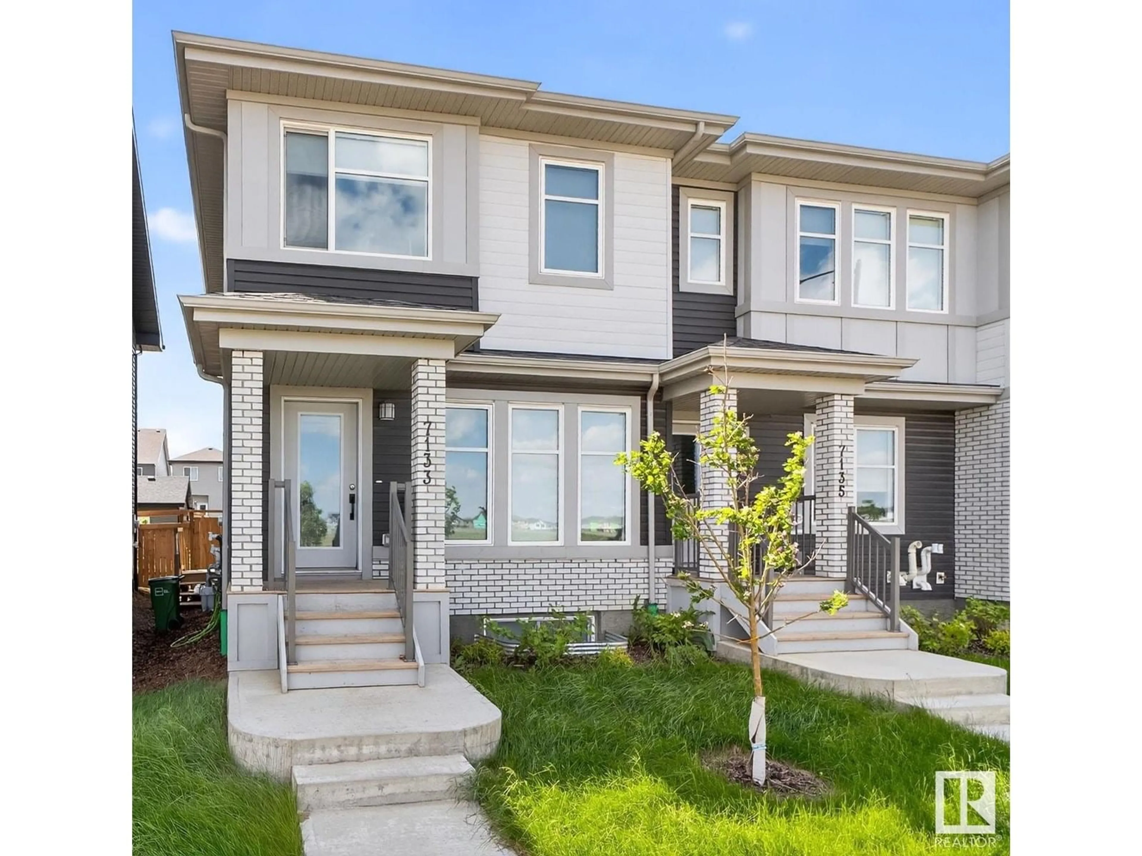 Home with vinyl exterior material, street for NW - 7133 178 AV, Edmonton Alberta T5Z0T8