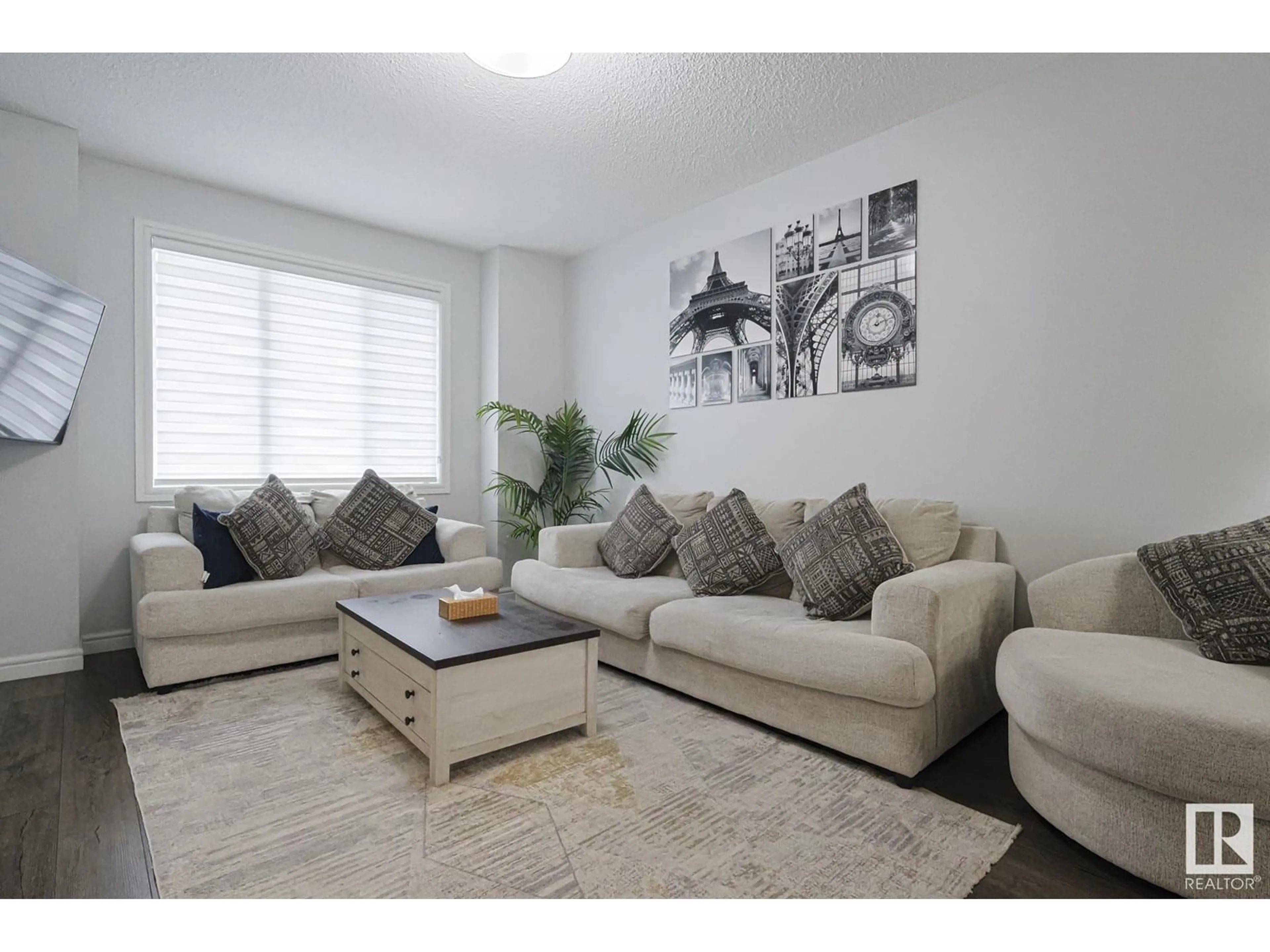 Living room with furniture, unknown for 5020 22 AV, Edmonton Alberta T6X2H7