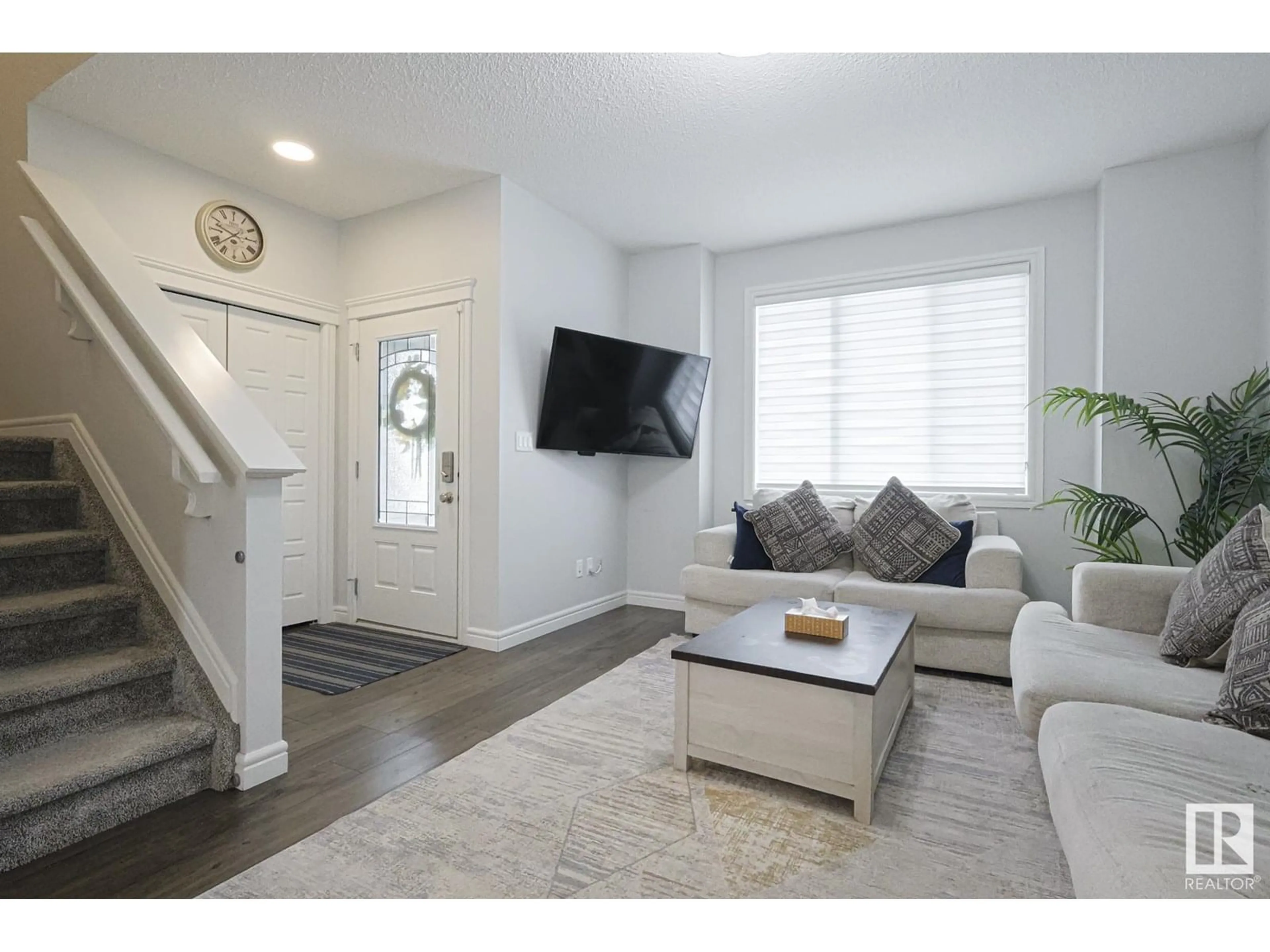 Living room with furniture, unknown for 5020 22 AV, Edmonton Alberta T6X2H7
