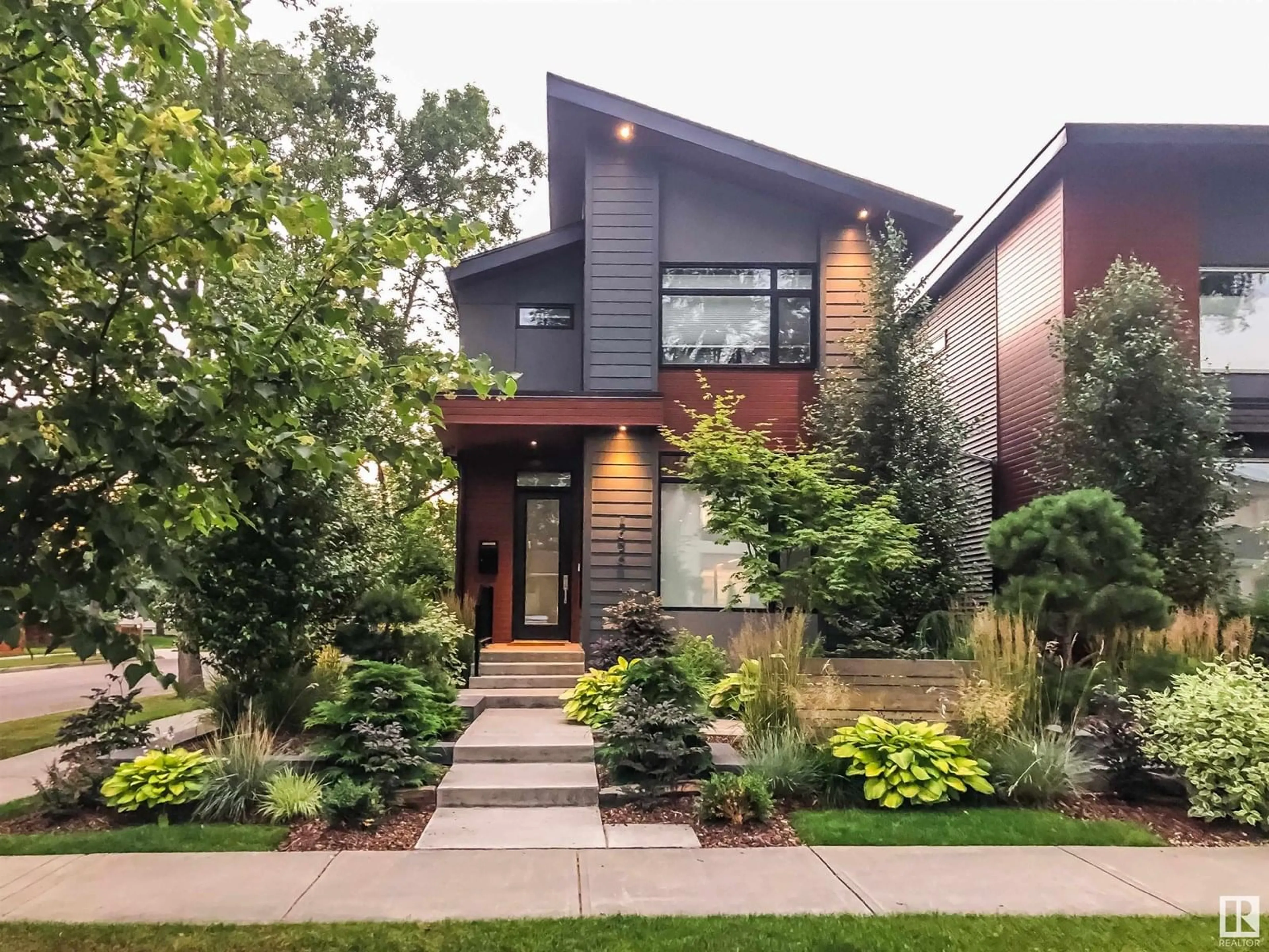 Home with brick exterior material, street for 7636 92 AV, Edmonton Alberta T6C1R4