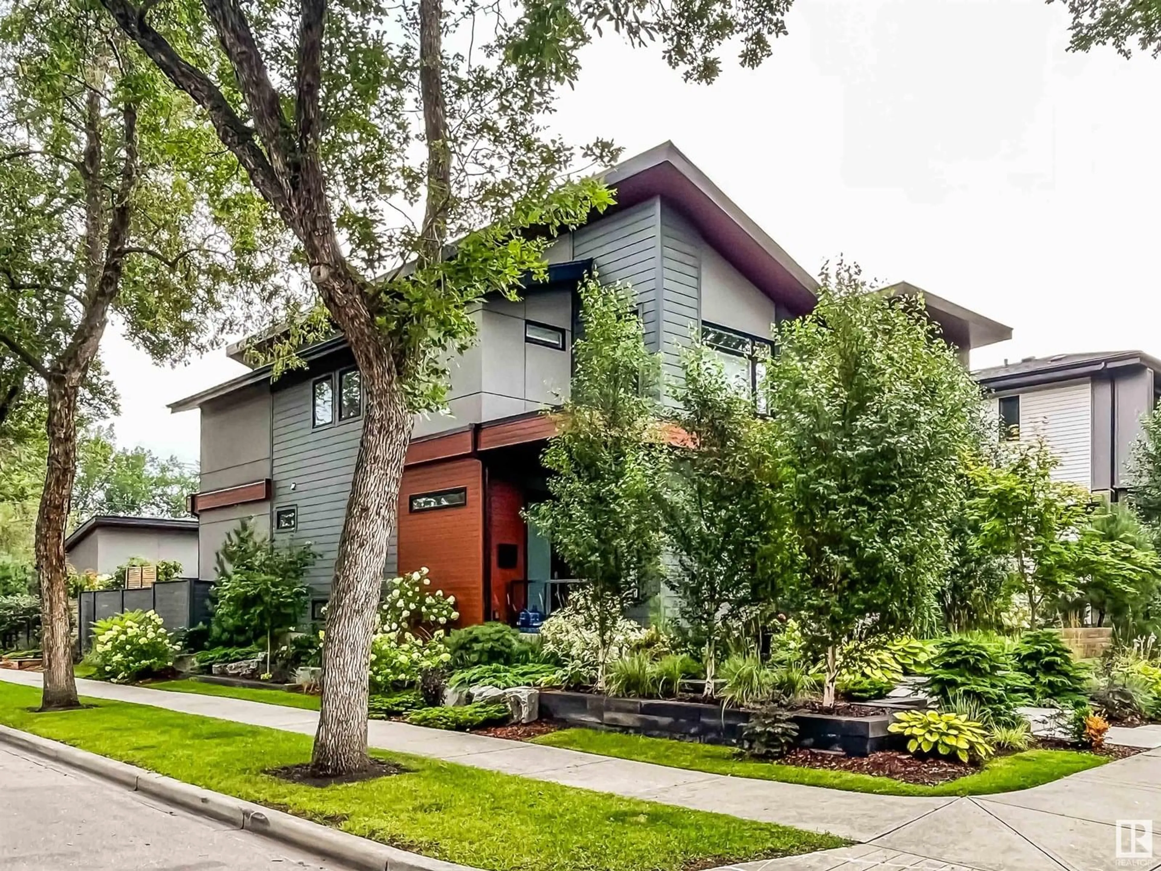 Home with brick exterior material, street for 7636 92 AV, Edmonton Alberta T6C1R4