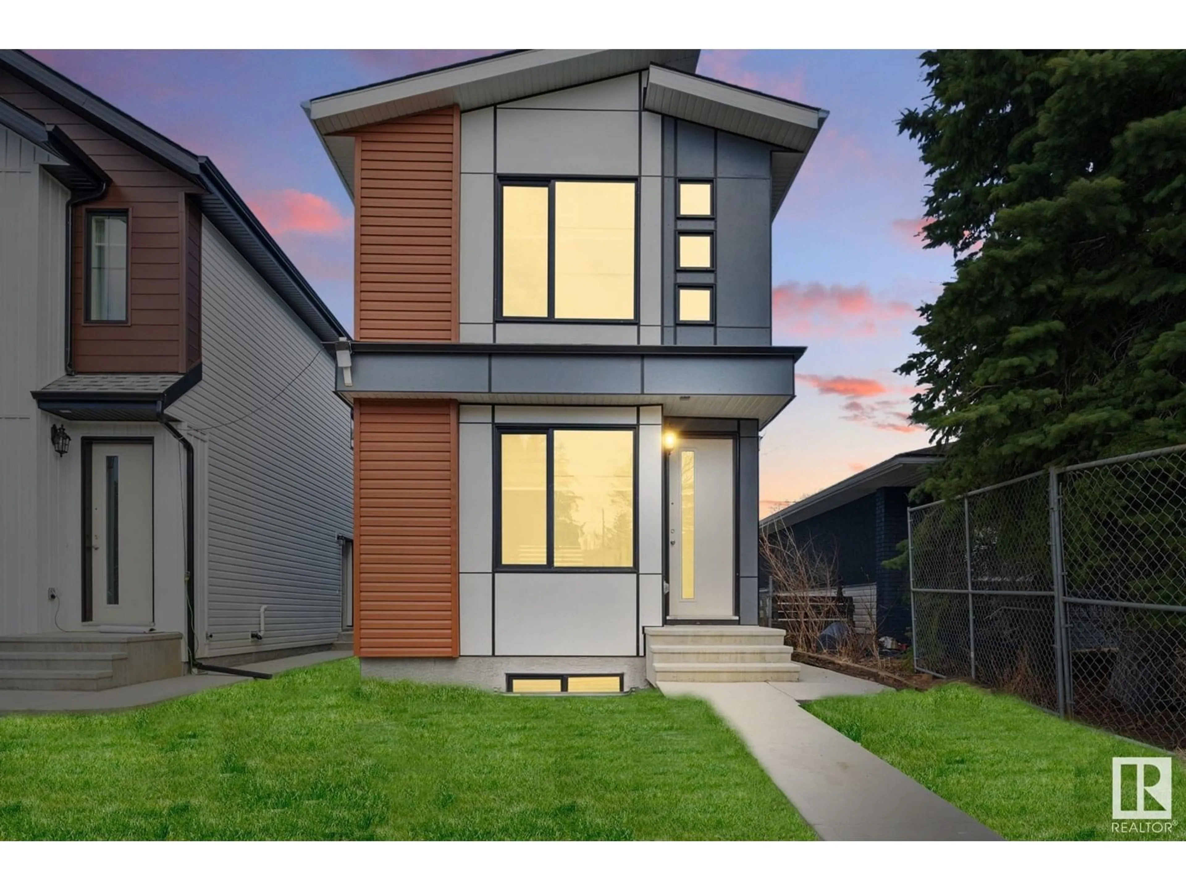 Home with brick exterior material, street for NW - 10711 52 ST, Edmonton Alberta T6A2H1