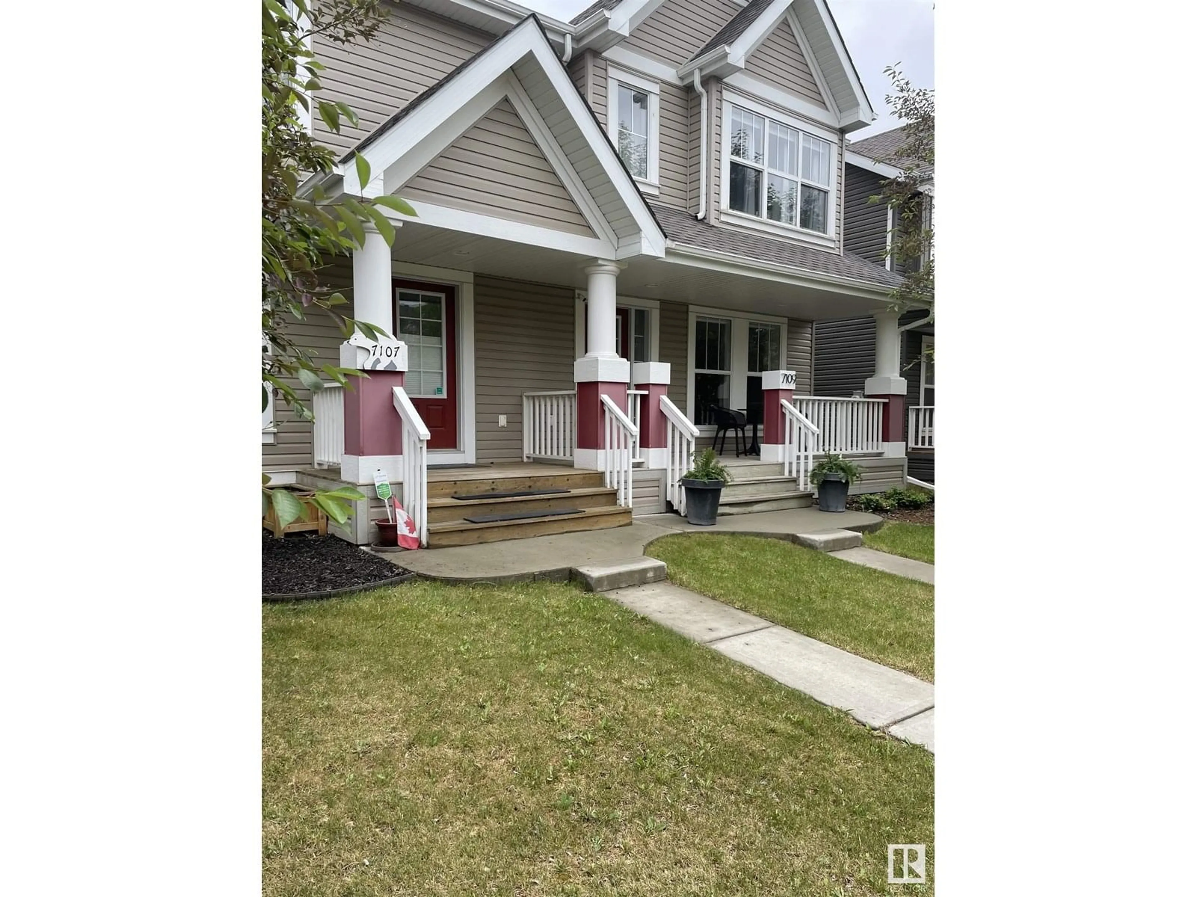 Home with vinyl exterior material, street for SW - 7107 22 AV, Edmonton Alberta T6X0T8