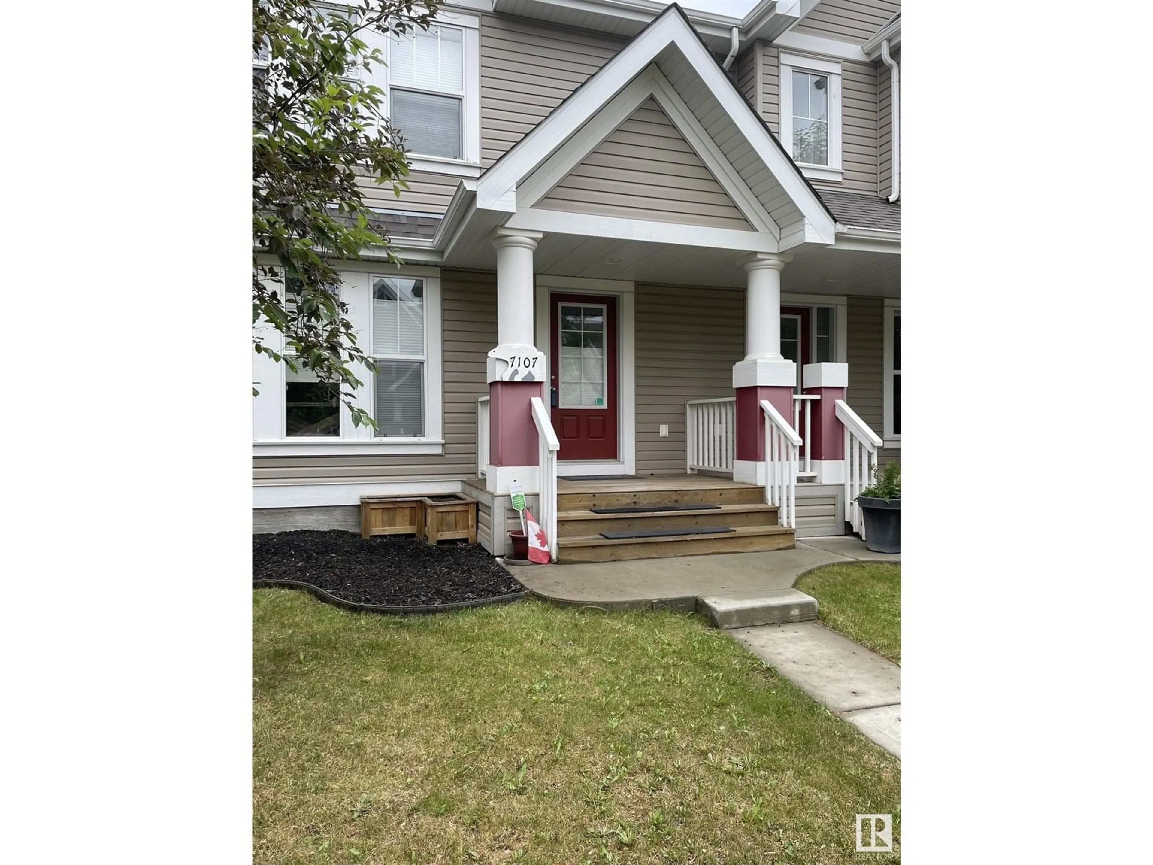 Home with vinyl exterior material, street for SW - 7107 22 AV, Edmonton Alberta T6X0T8