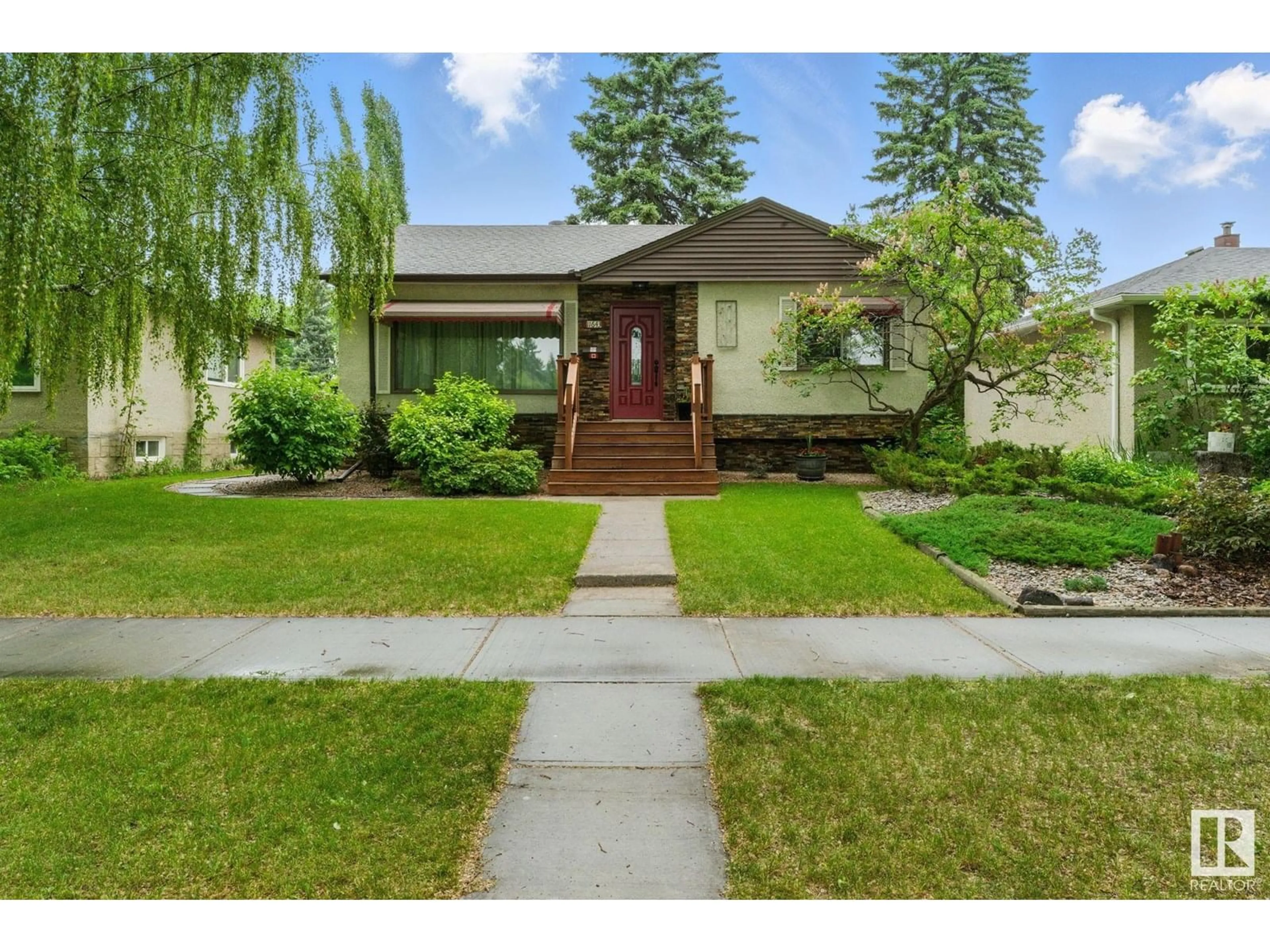 Home with brick exterior material, street for 11643 137 ST, Edmonton Alberta T5M1N8