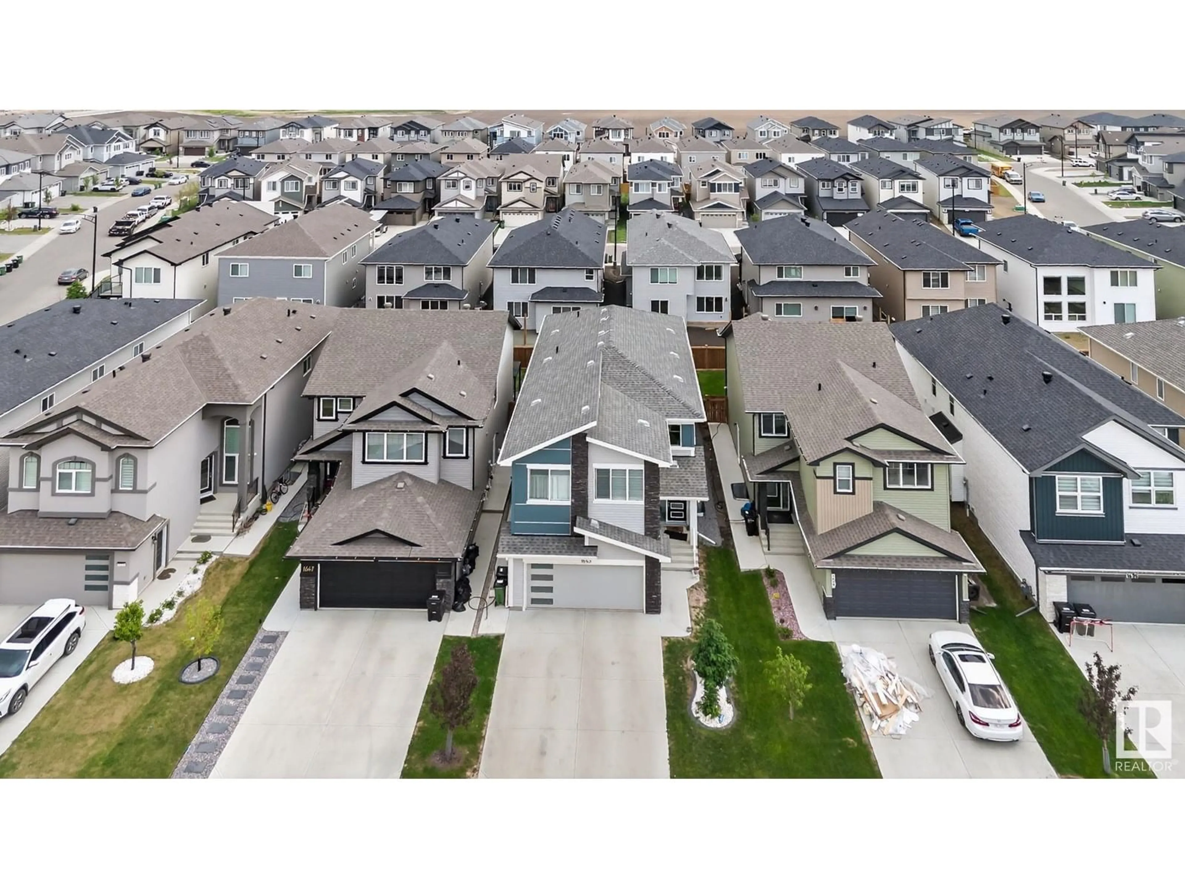 A pic from outside/outdoor area/front of a property/back of a property/a pic from drone, street for 1643 14 ST, Edmonton Alberta T6T2N6