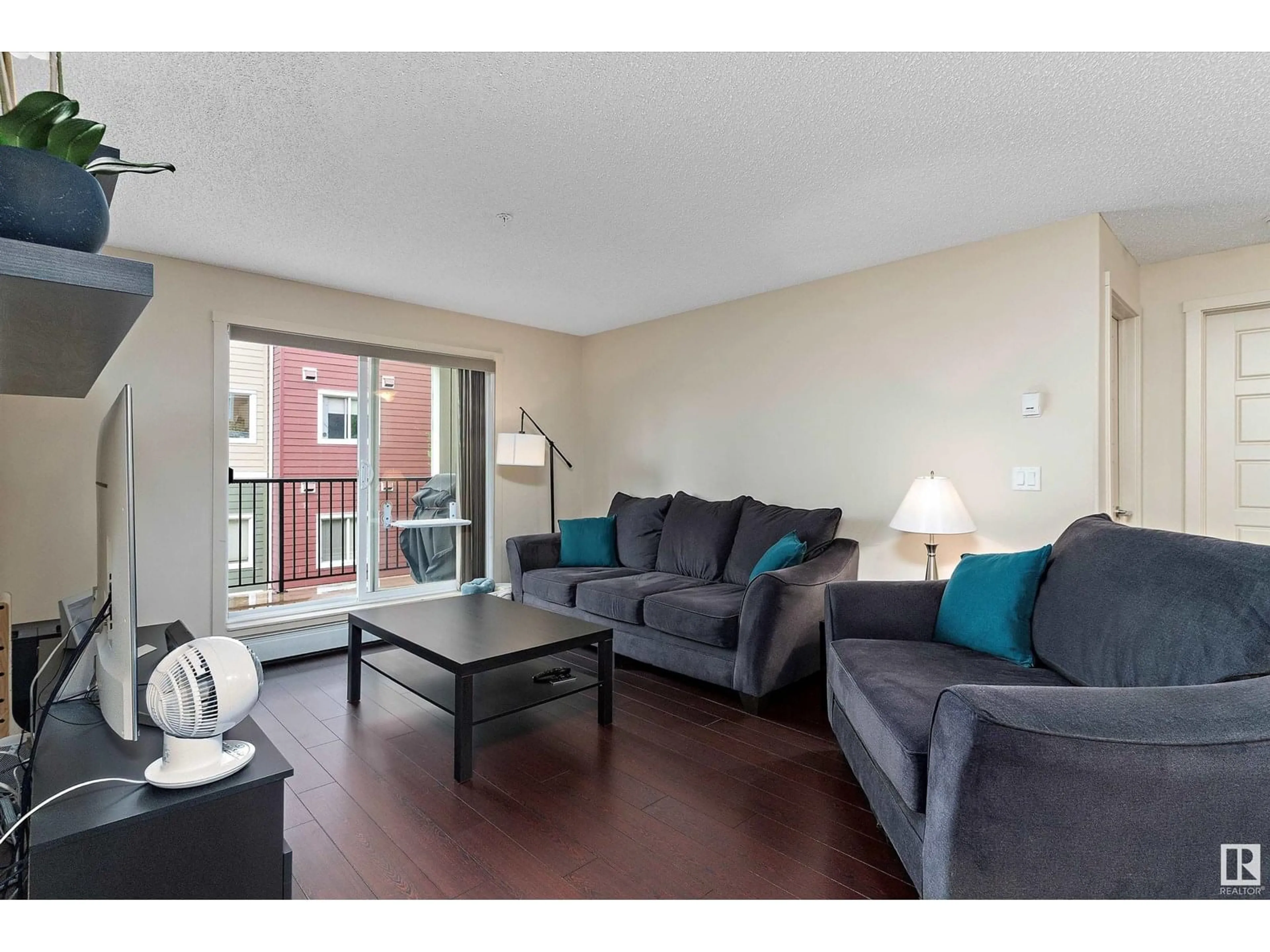 Living room with furniture, unknown for 6076 - 238 SCHONSEE WY, Edmonton Alberta T5Z0K8