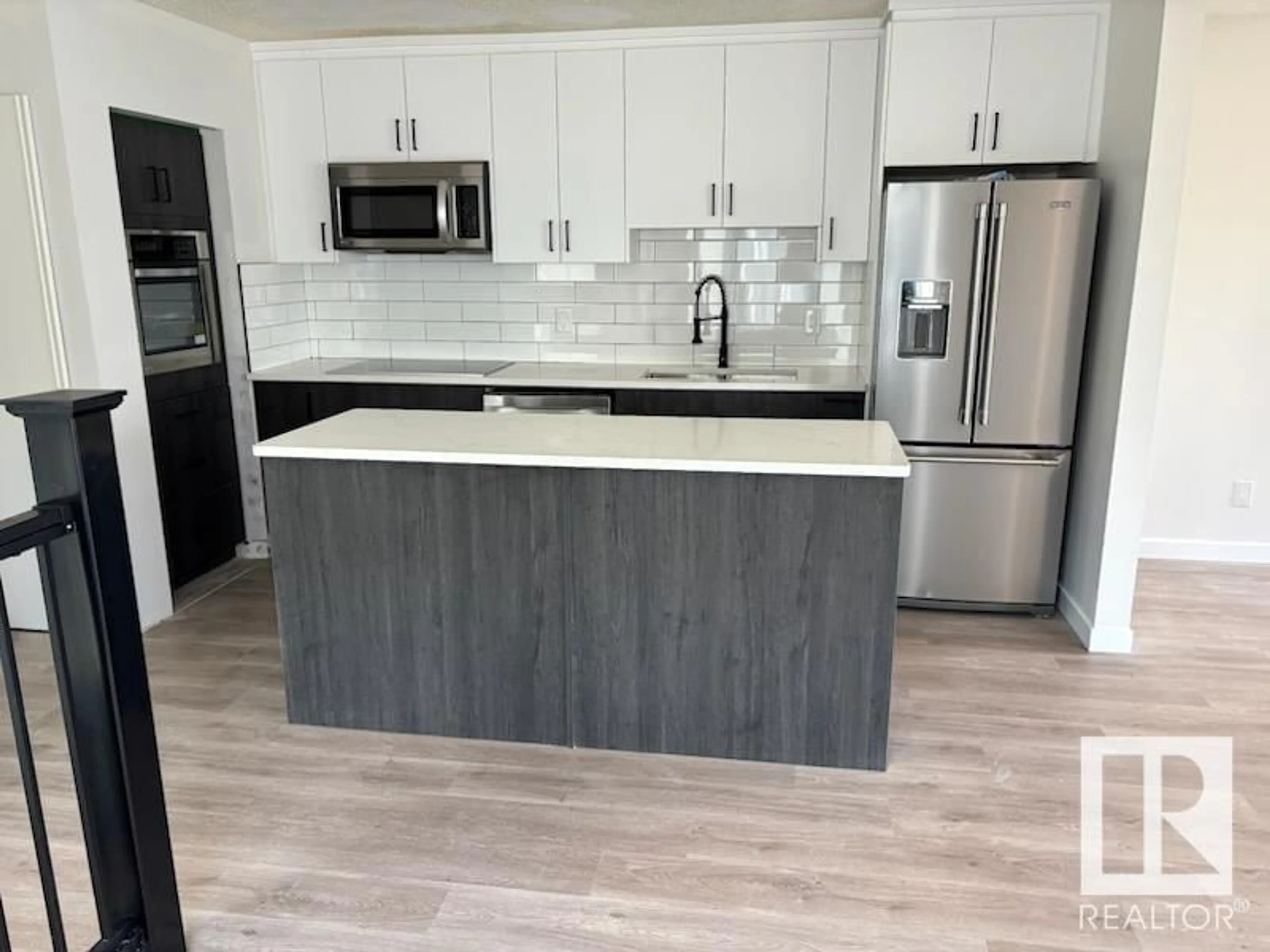 Open concept kitchen, unknown for NW - 4667 126 AV, Edmonton Alberta T5A4L1