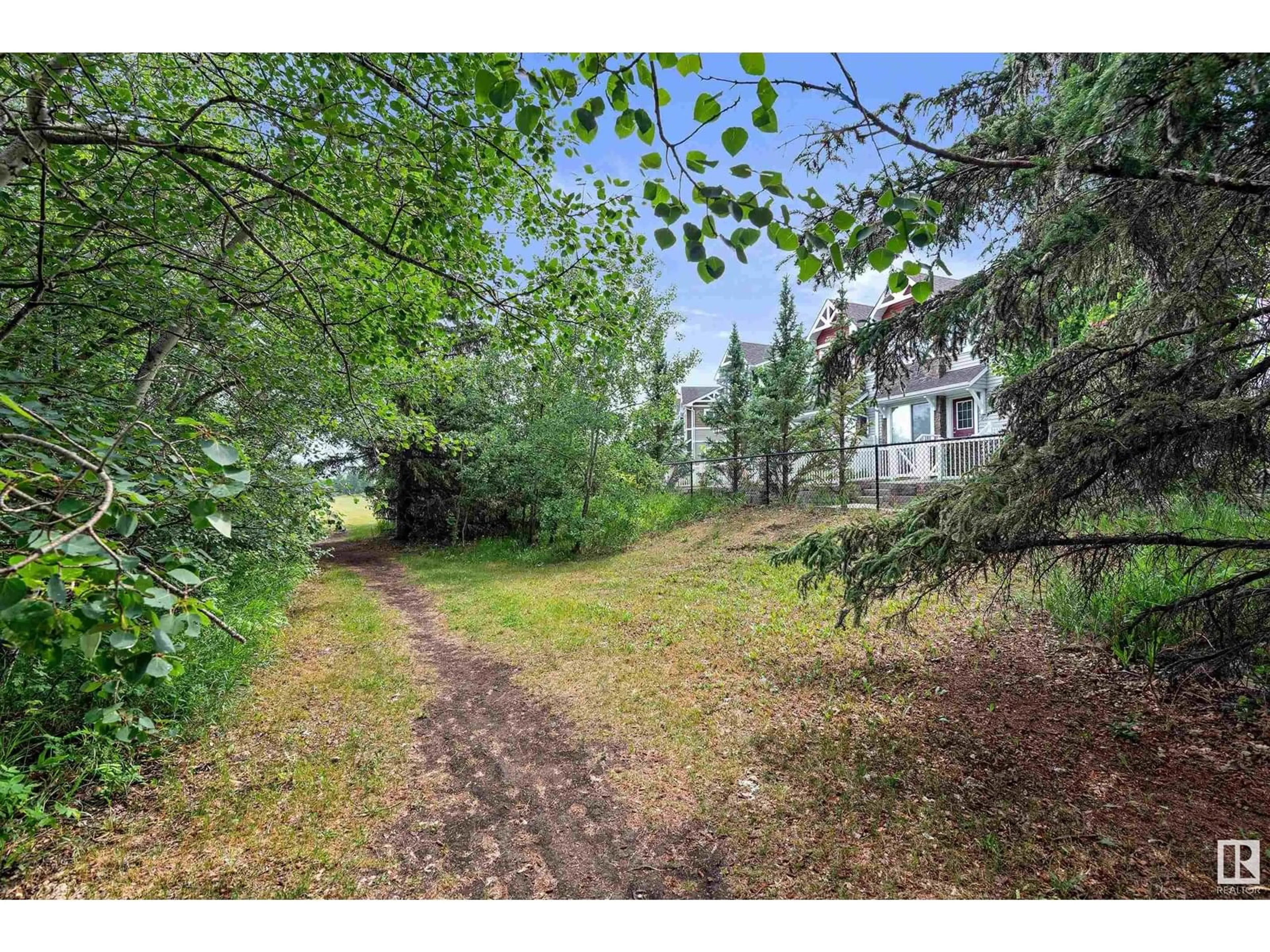 A pic from outside/outdoor area/front of a property/back of a property/a pic from drone, forest/trees view for 24 CLAREVIEW RD, Edmonton Alberta T5A0Z6