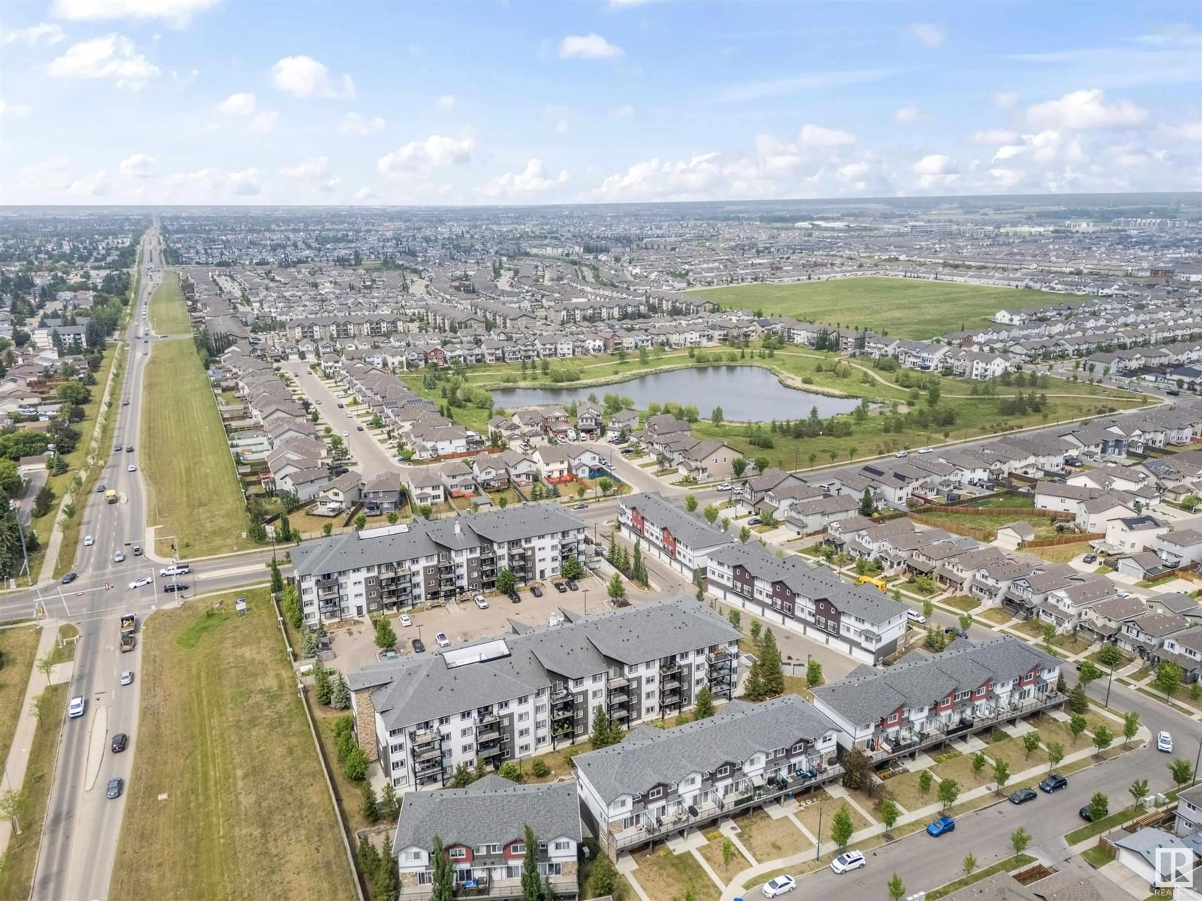 A pic from outside/outdoor area/front of a property/back of a property/a pic from drone, street for #206 - 3353 16A AV, Edmonton Alberta T6T0V4