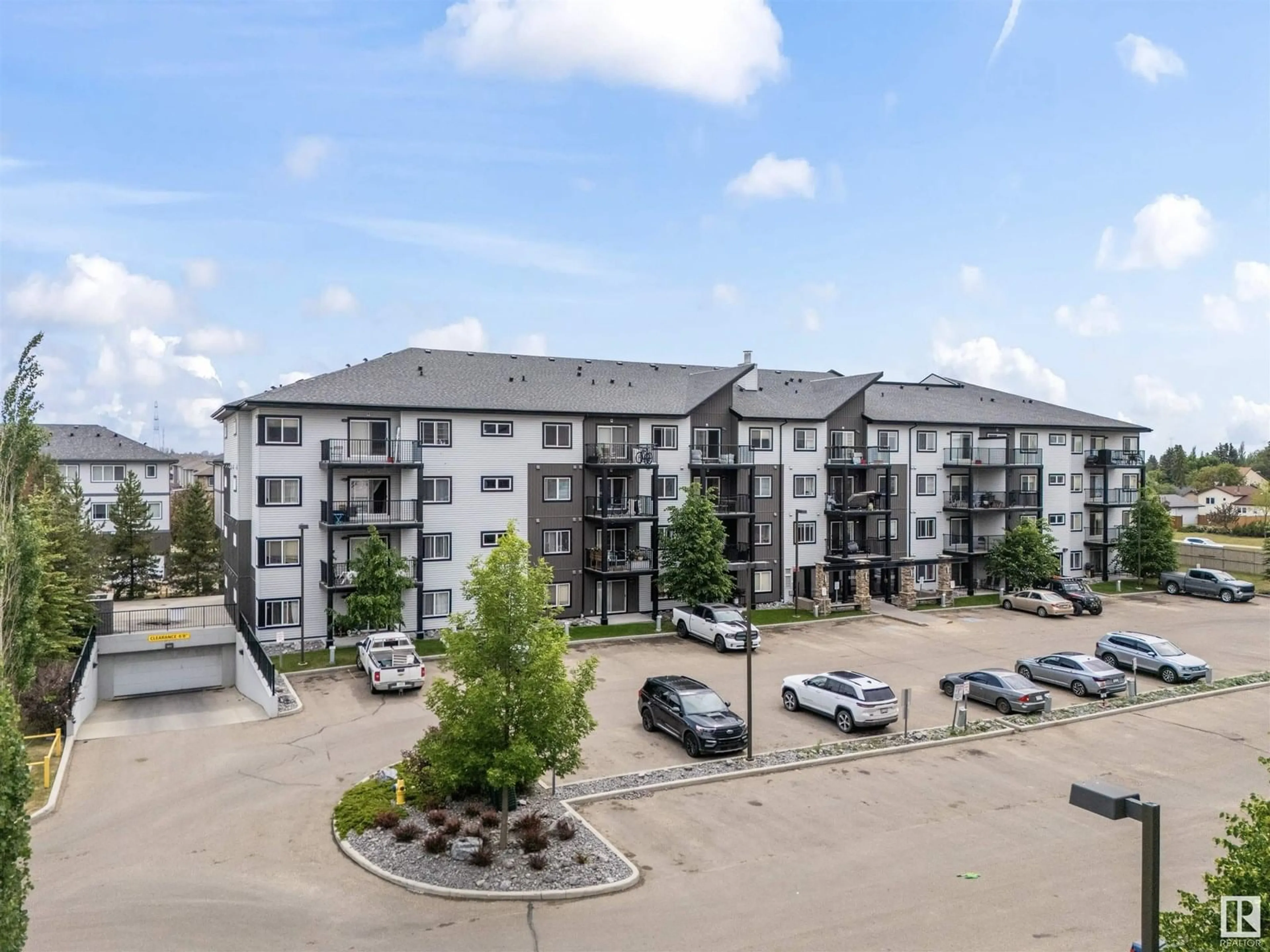 A pic from outside/outdoor area/front of a property/back of a property/a pic from drone, unknown for #206 - 3353 16A AV, Edmonton Alberta T6T0V4