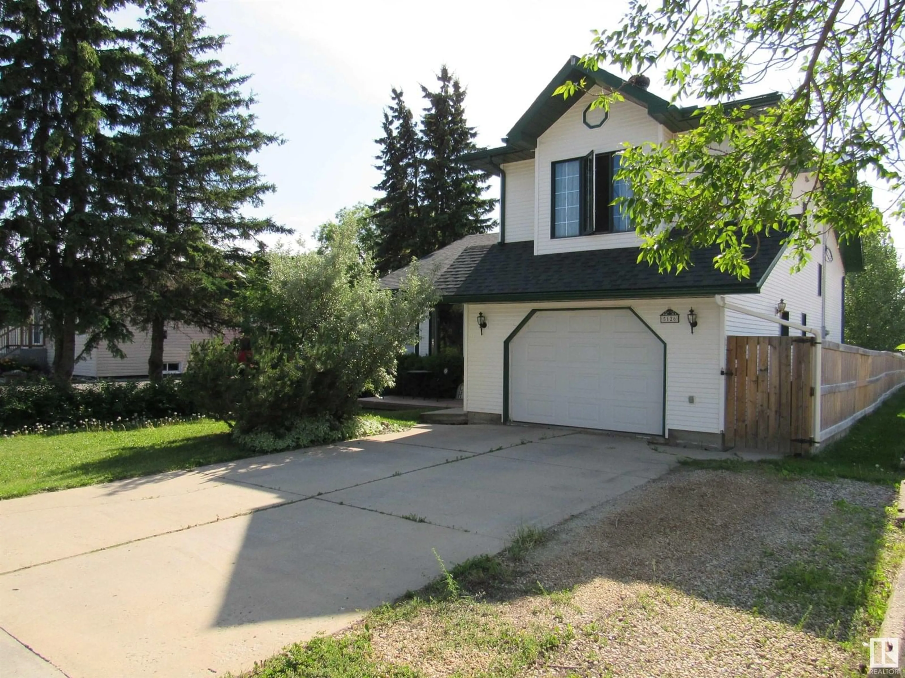 Home with vinyl exterior material, street for 5126 46 STREET, Barrhead Alberta T7N1H8