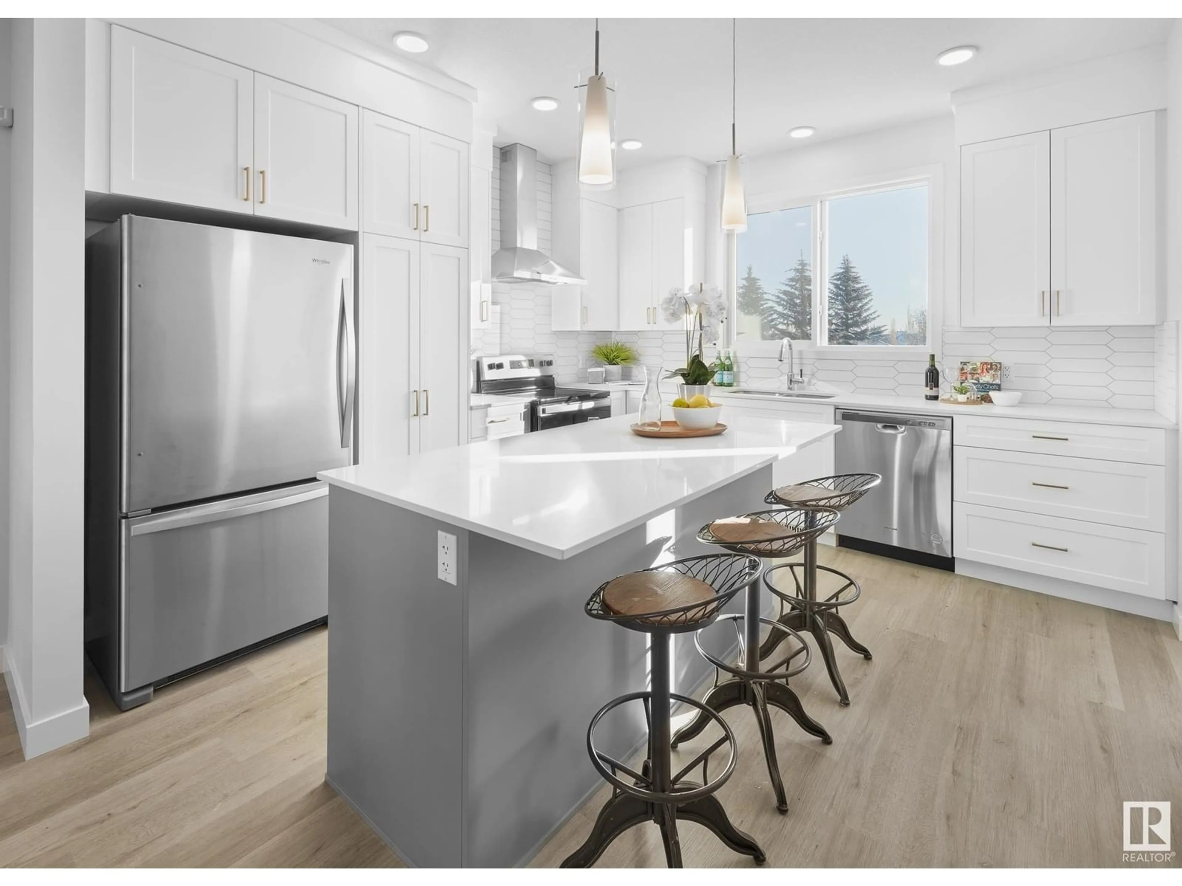 Open concept kitchen, wood/laminate floor for 1306 PODERSKY WD, Edmonton Alberta T6W5E4