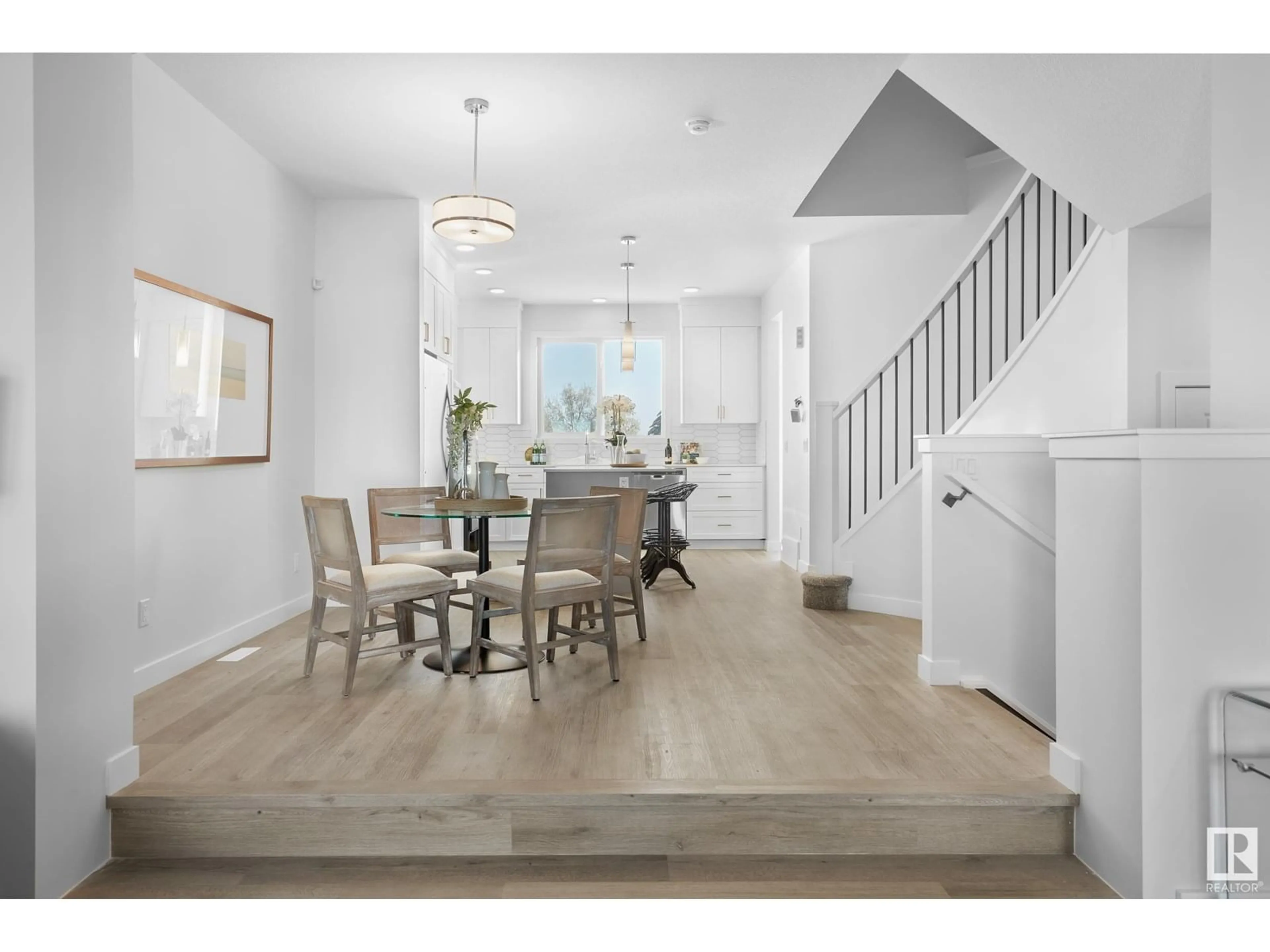 Dining room, wood/laminate floor for 1306 PODERSKY WD, Edmonton Alberta T6W5E4