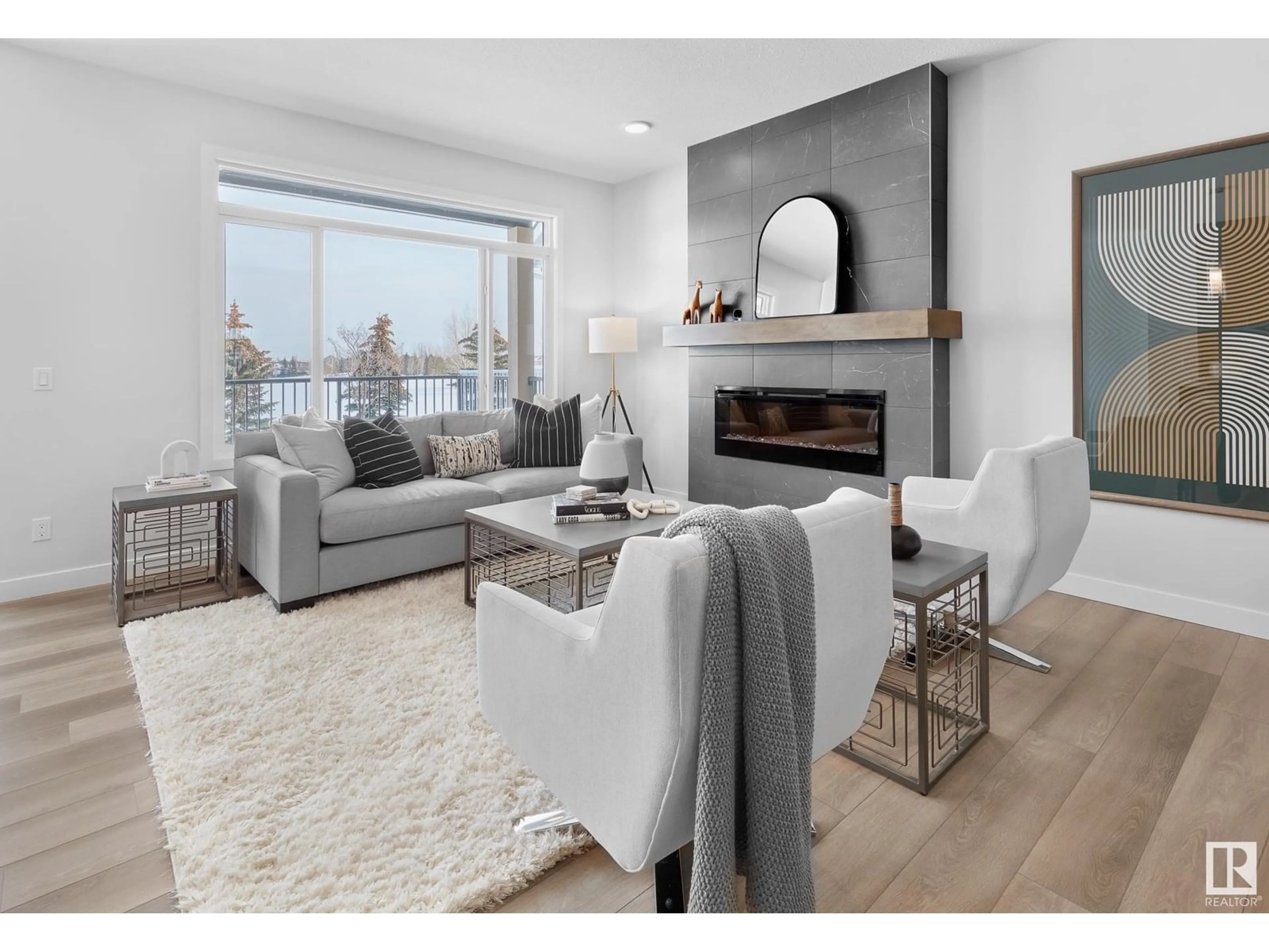 Living room with furniture, wood/laminate floor for 4811 CAWSEY TC, Edmonton Alberta T6W5M7