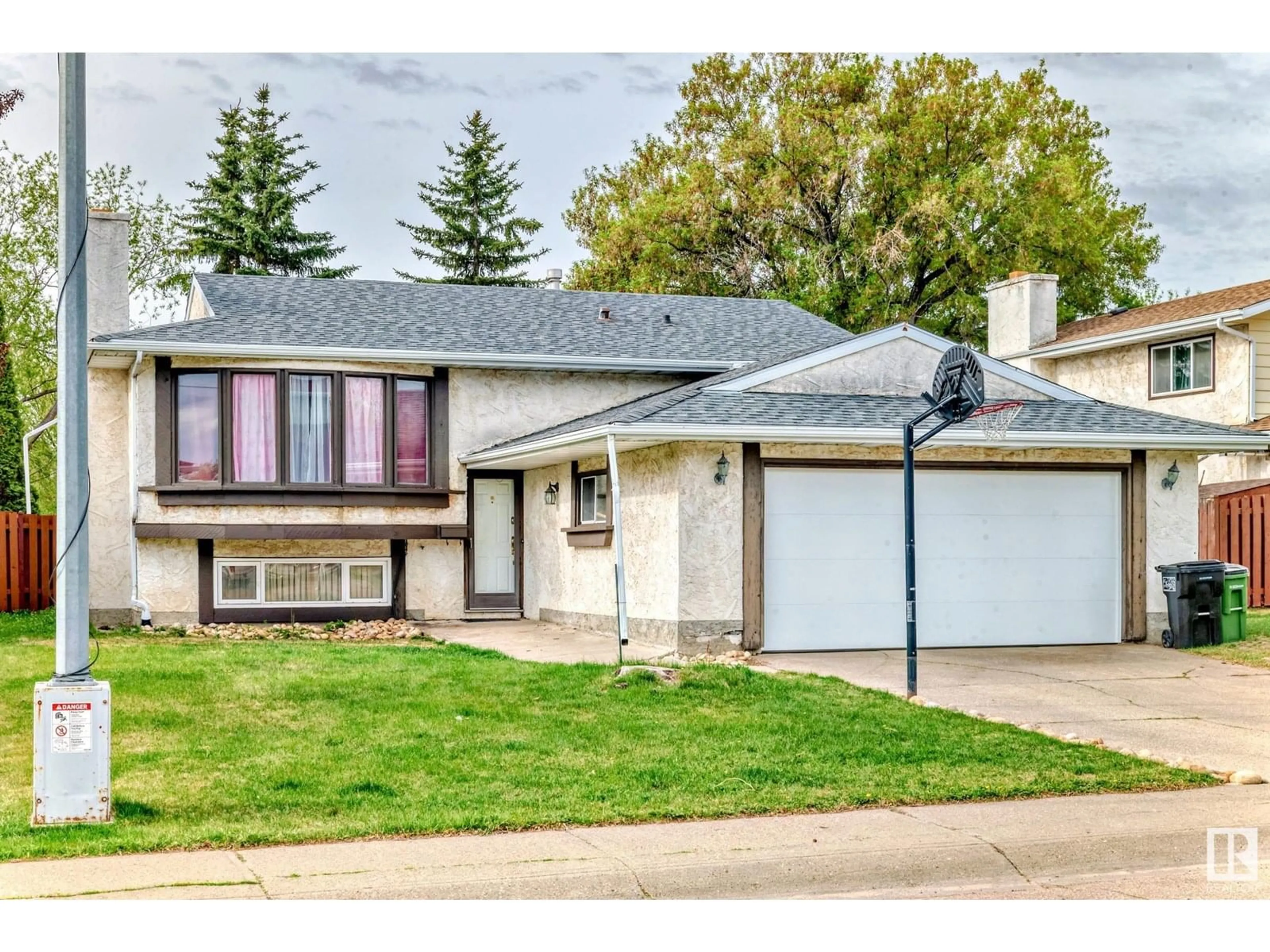 Home with vinyl exterior material, street for 18623 62A AV, Edmonton Alberta T5T2T4