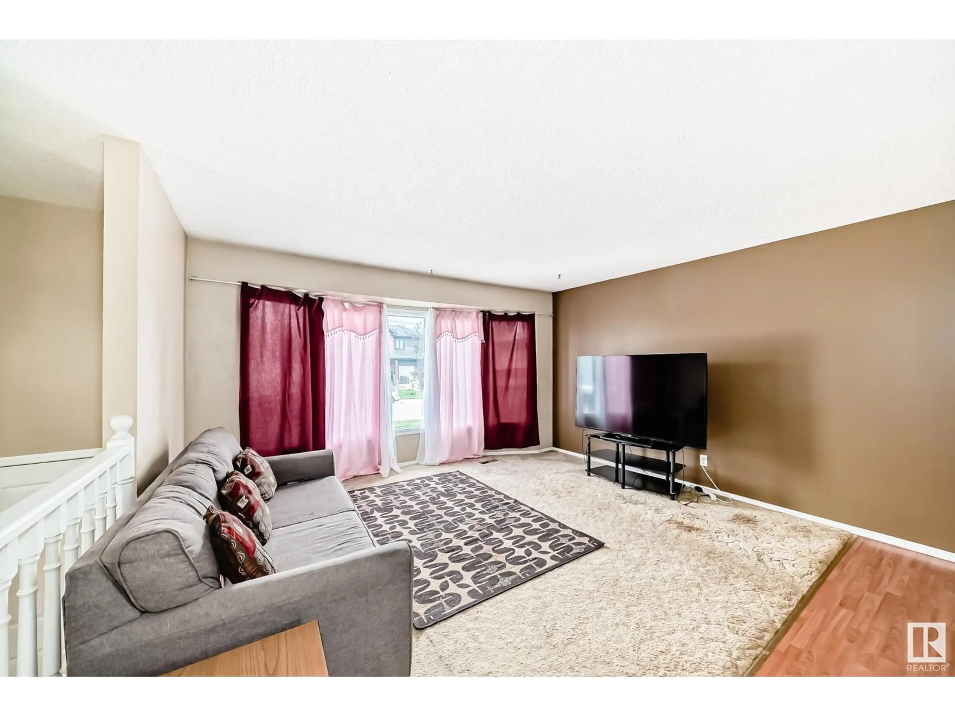Living room with furniture, unknown for 18623 62A AV, Edmonton Alberta T5T2T4