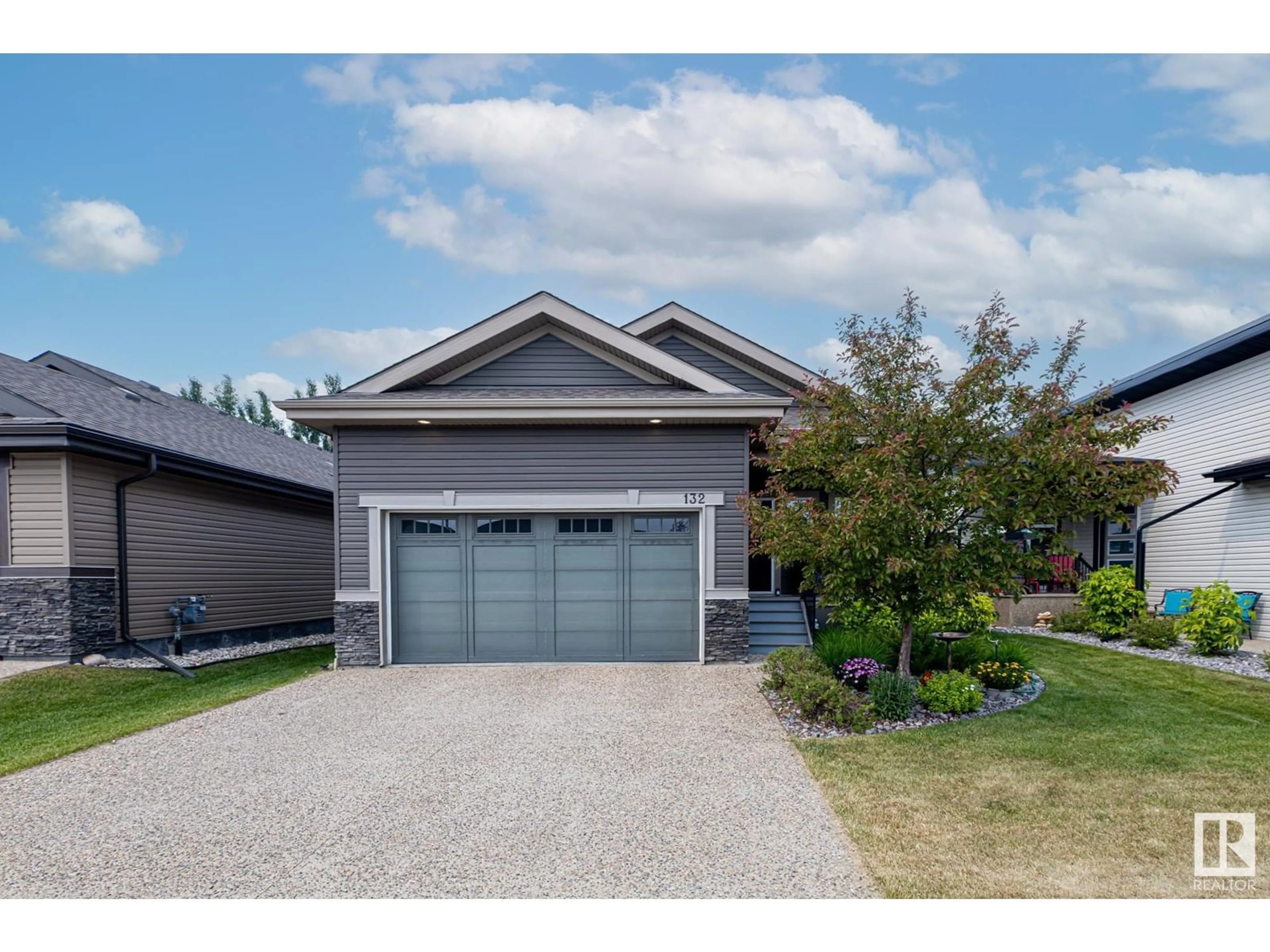 Home with vinyl exterior material, street for 50 - 132 HEATHERGLEN DR, Spruce Grove Alberta T7X0R6