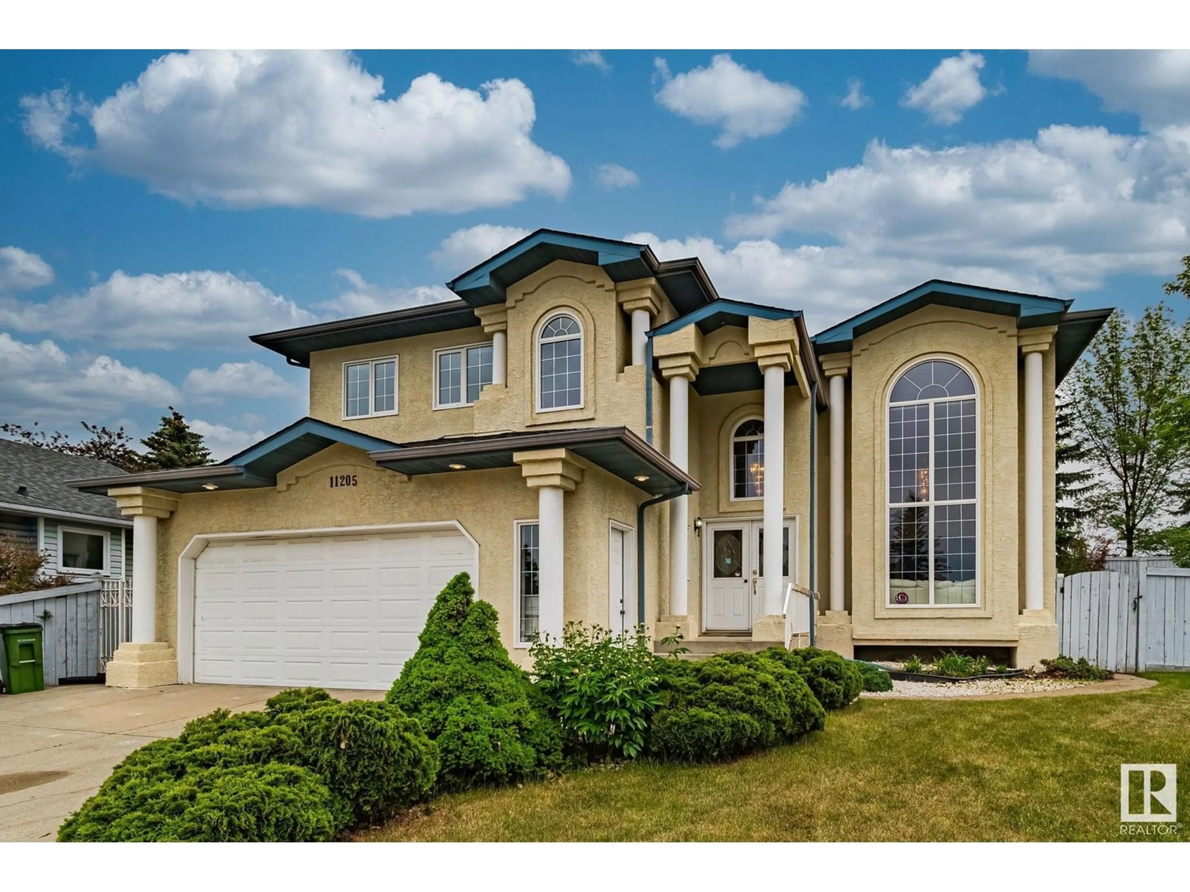 Home with vinyl exterior material, street for 11205 10 AV, Edmonton Alberta T5J6S8