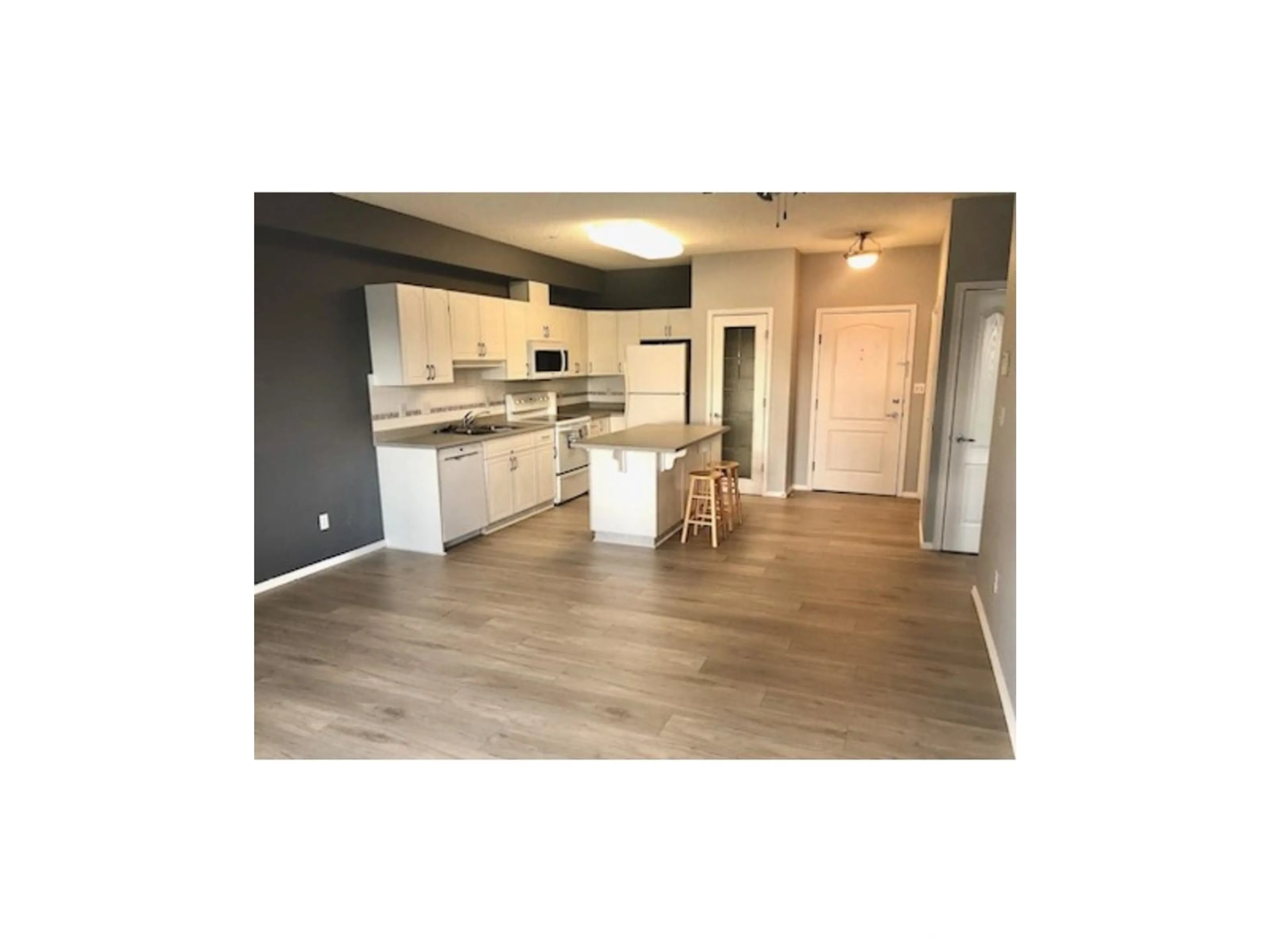 Open concept kitchen, wood/laminate floor for 12111 - 315 51 AV, Edmonton Alberta T6H6A3