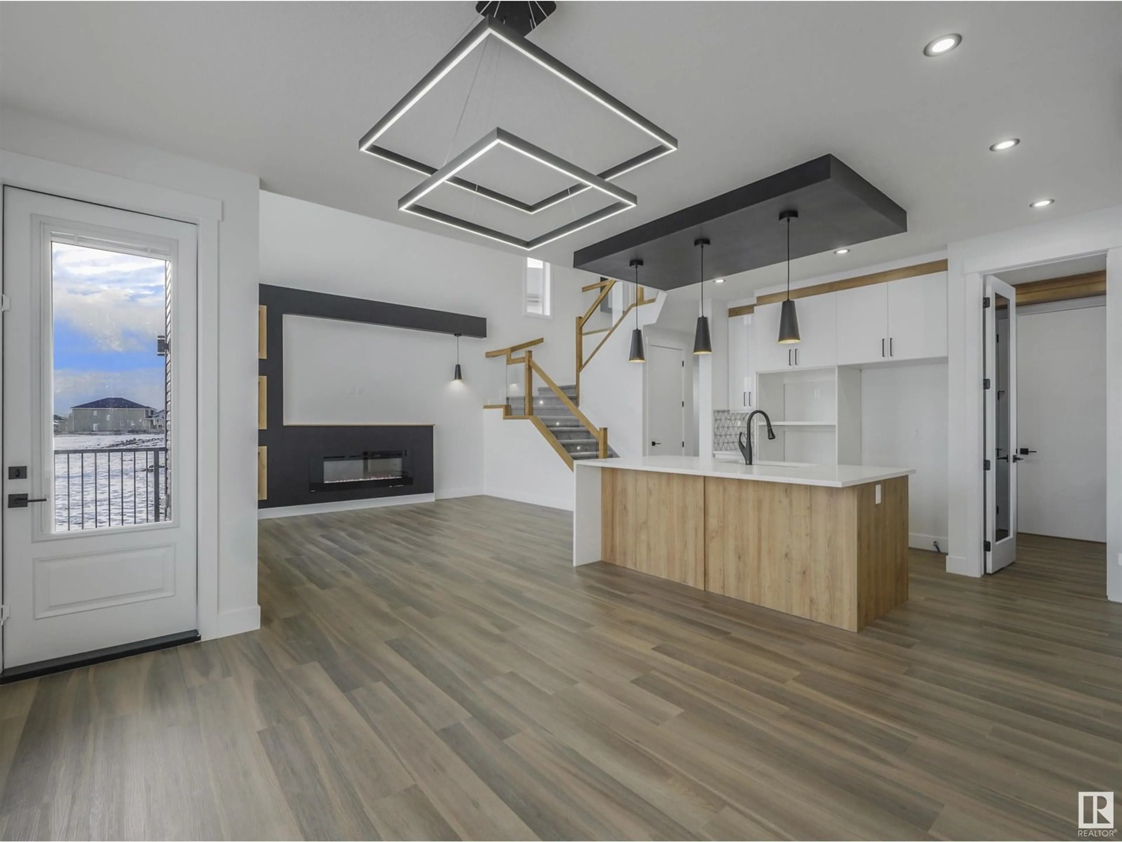 Open concept kitchen, wood/laminate floor for SW - 2004 COLLIP CR, Edmonton Alberta T6W5C7