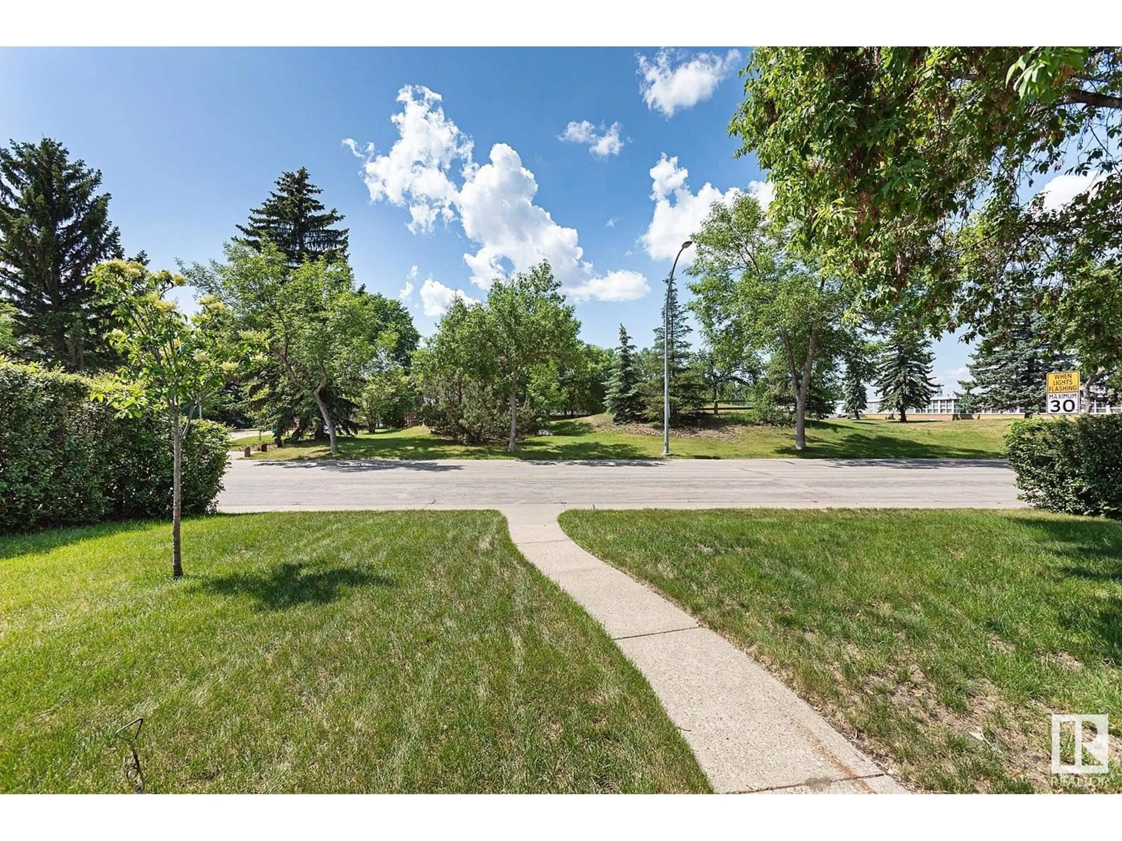 A pic from outside/outdoor area/front of a property/back of a property/a pic from drone, unknown for NW - 10515 46 ST, Edmonton Alberta T6A1Y2