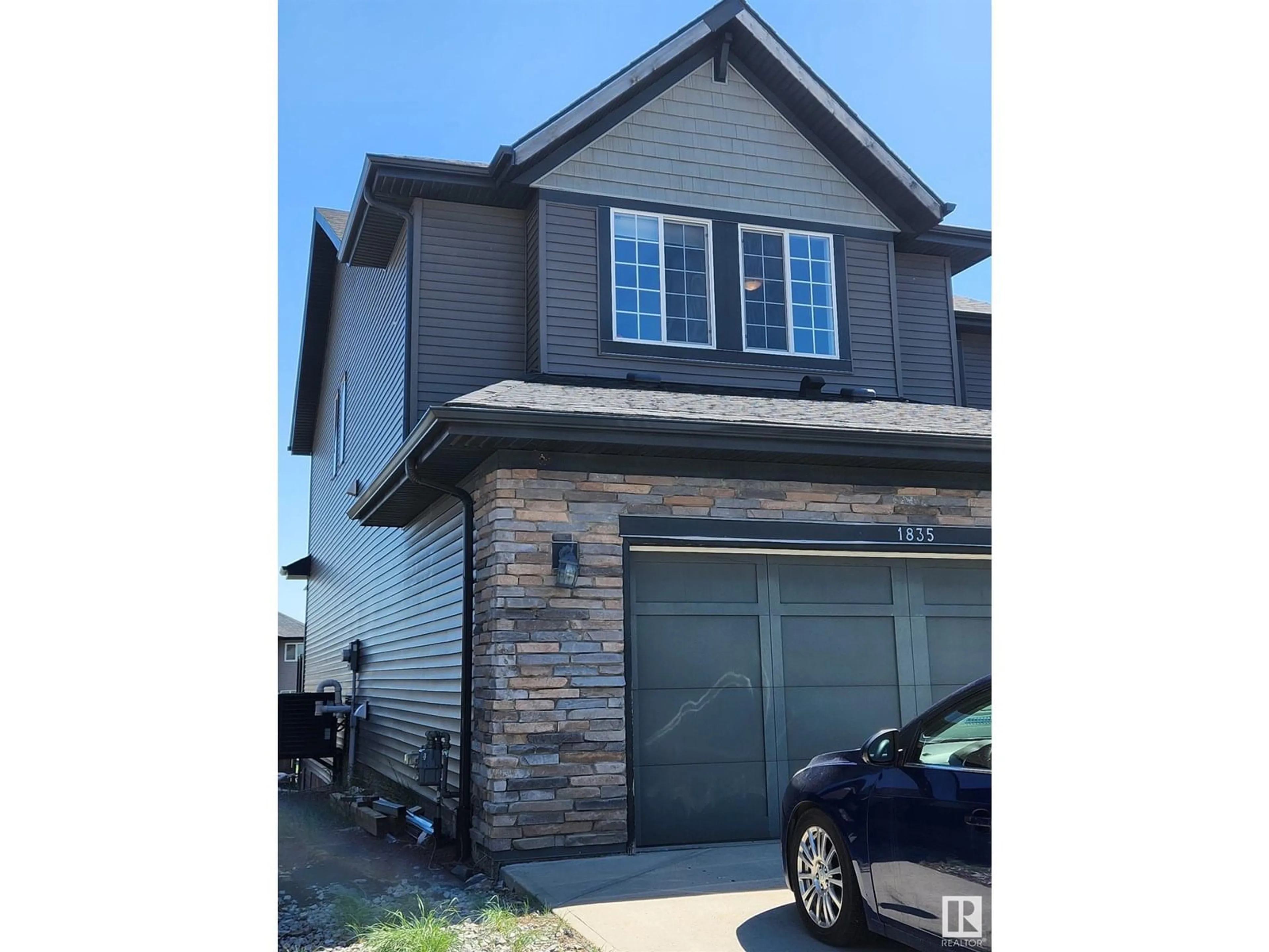 Home with vinyl exterior material, street for SW - 1835 56 ST, Edmonton Alberta T6X1T6
