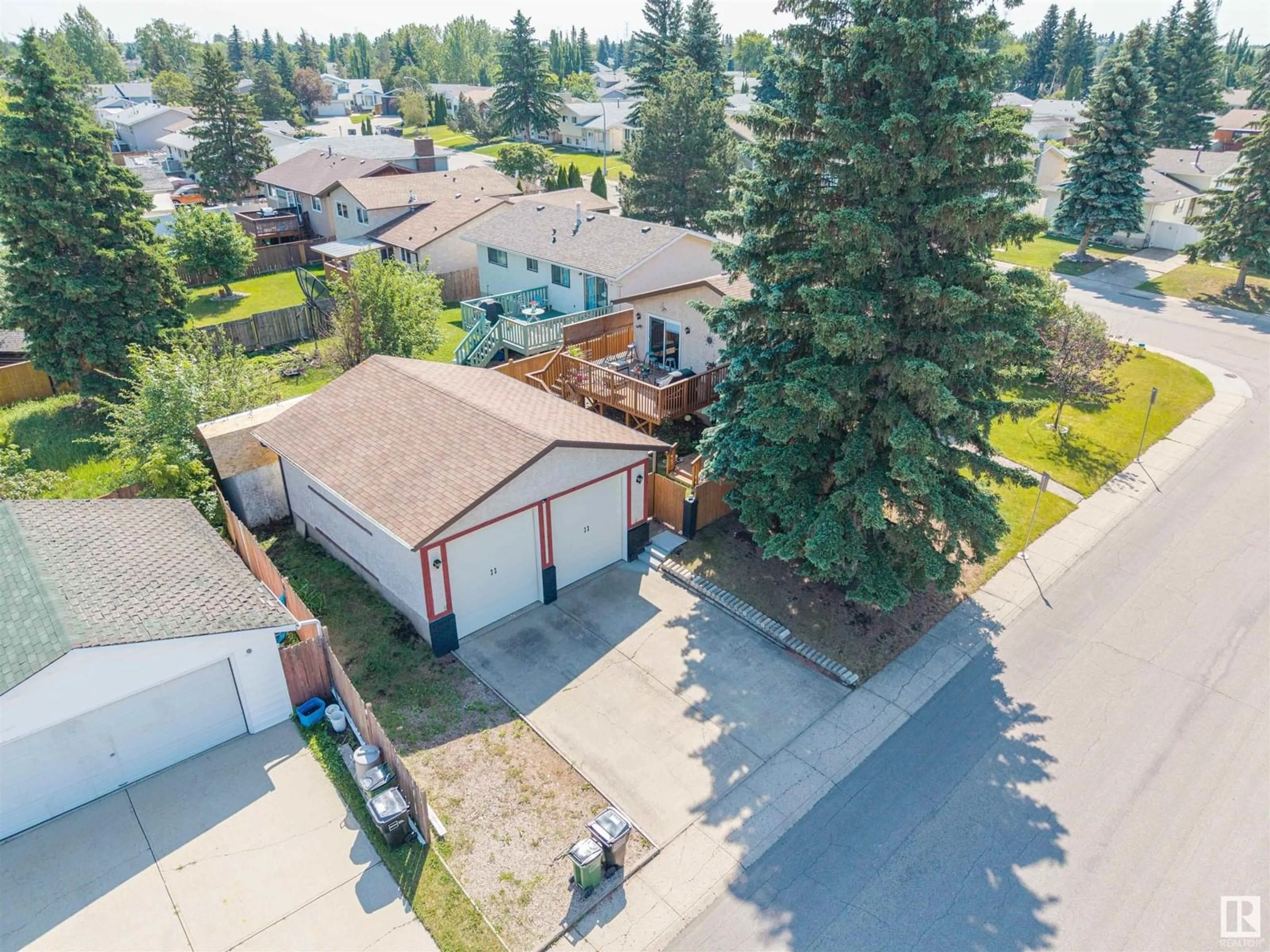 A pic from outside/outdoor area/front of a property/back of a property/a pic from drone, street for 1435 53 ST, Edmonton Alberta T6L2Y9