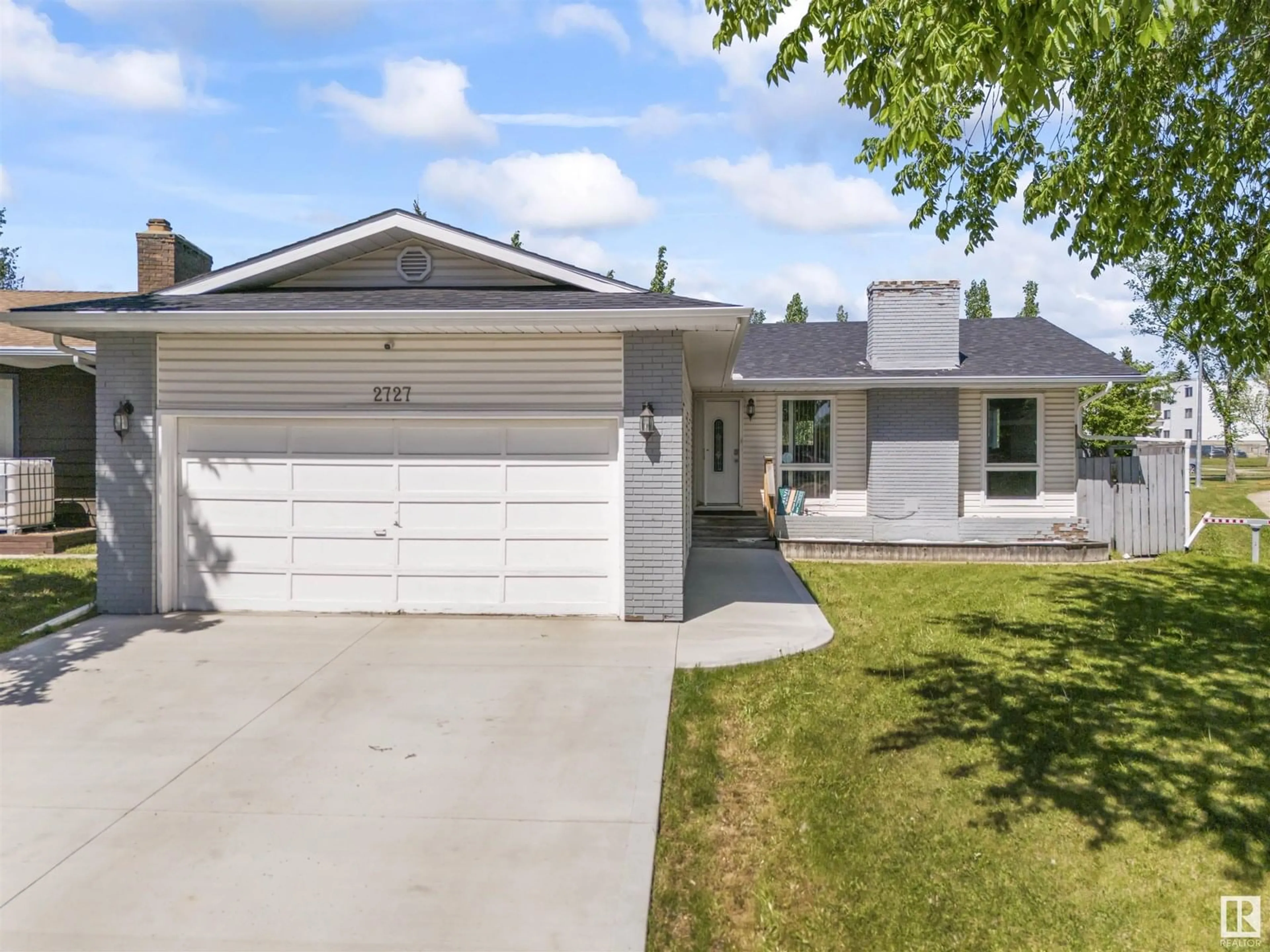 Home with vinyl exterior material, street for 2727 83 STREET, Edmonton Alberta T6K3G7
