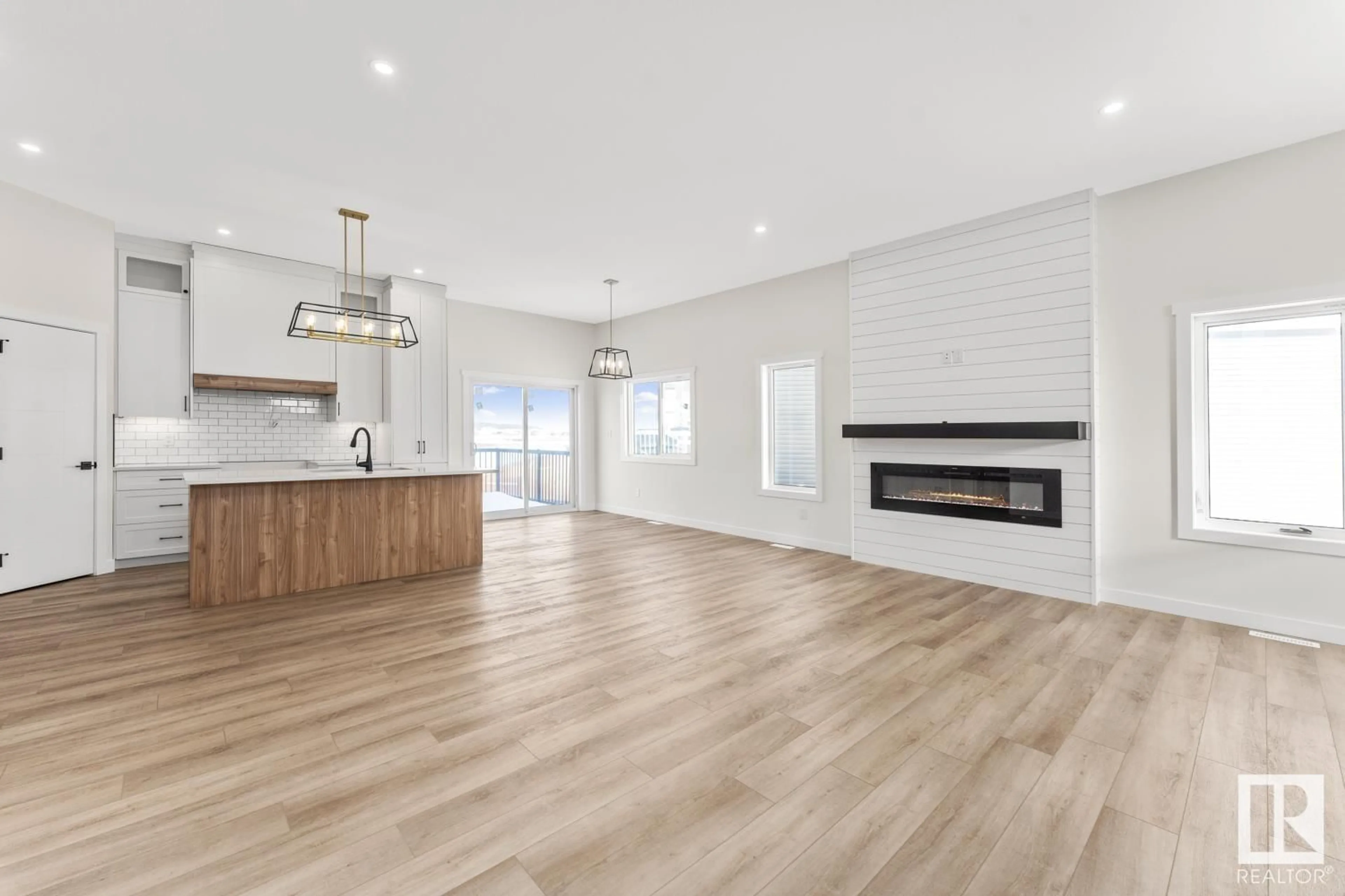 Open concept kitchen, wood/laminate floor for 328 FUNDY WY, Cold Lake Alberta T9M0M4