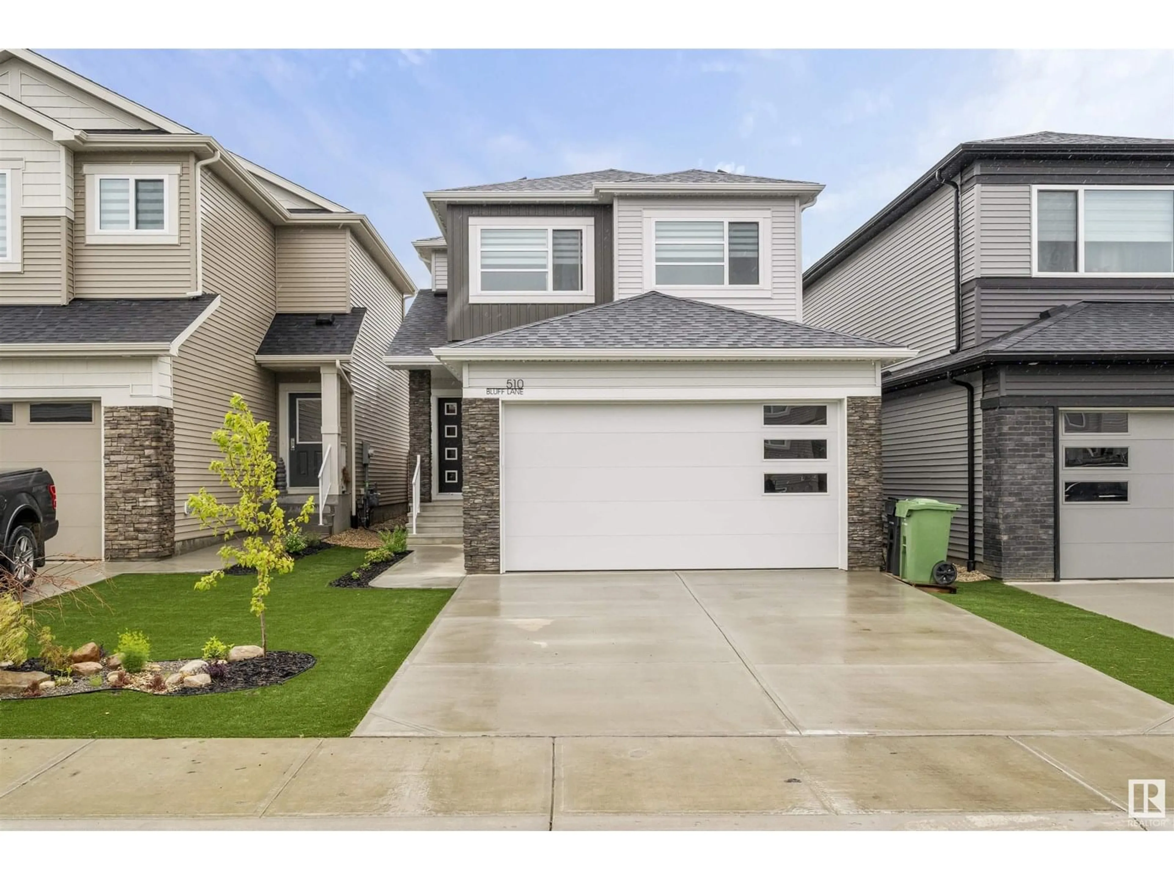 Home with vinyl exterior material, street for 510 BLUFF LN, Leduc Alberta T9E1M8