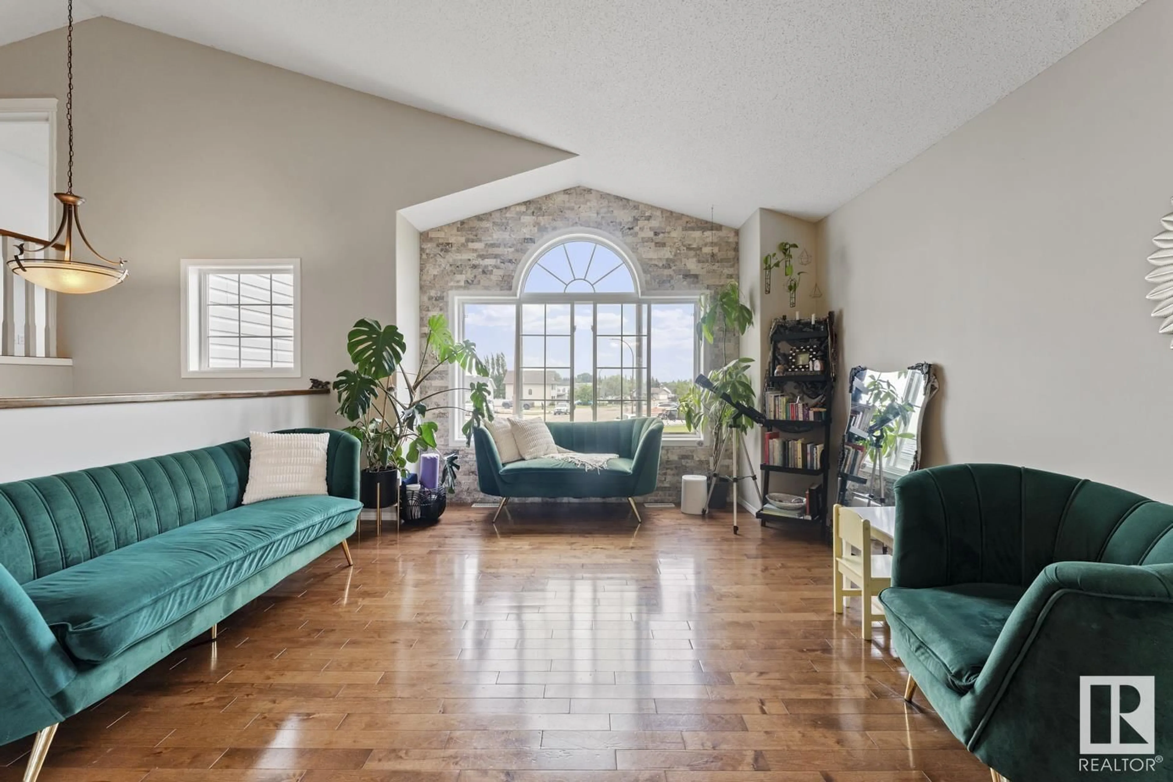 Living room with furniture, ceramic/tile floor for 712 GROUSE CL, Cold Lake Alberta T9M0A5
