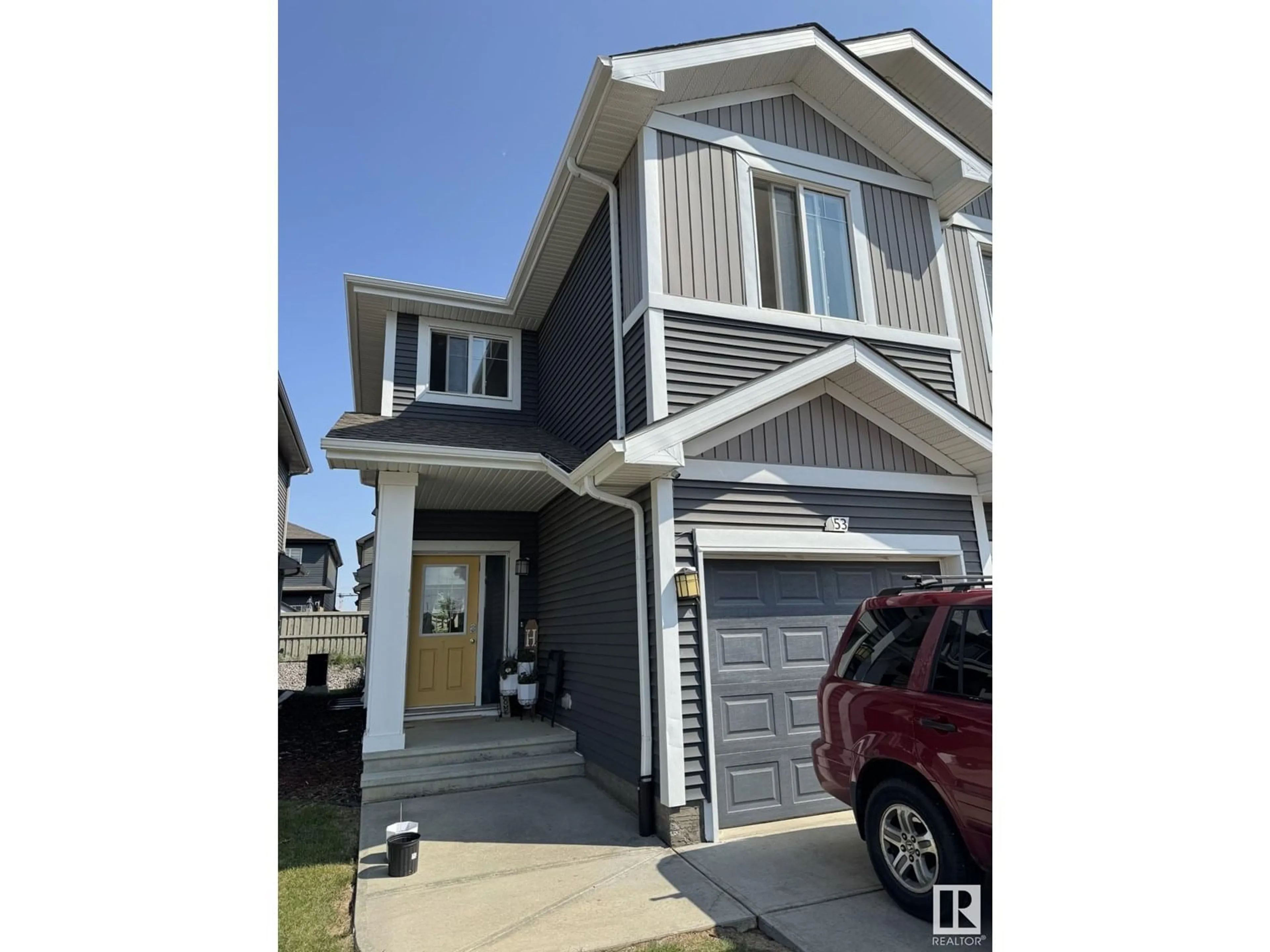 Home with vinyl exterior material, street for 6004 - 53 ROSENTHAL WY, Edmonton Alberta T5T7L1