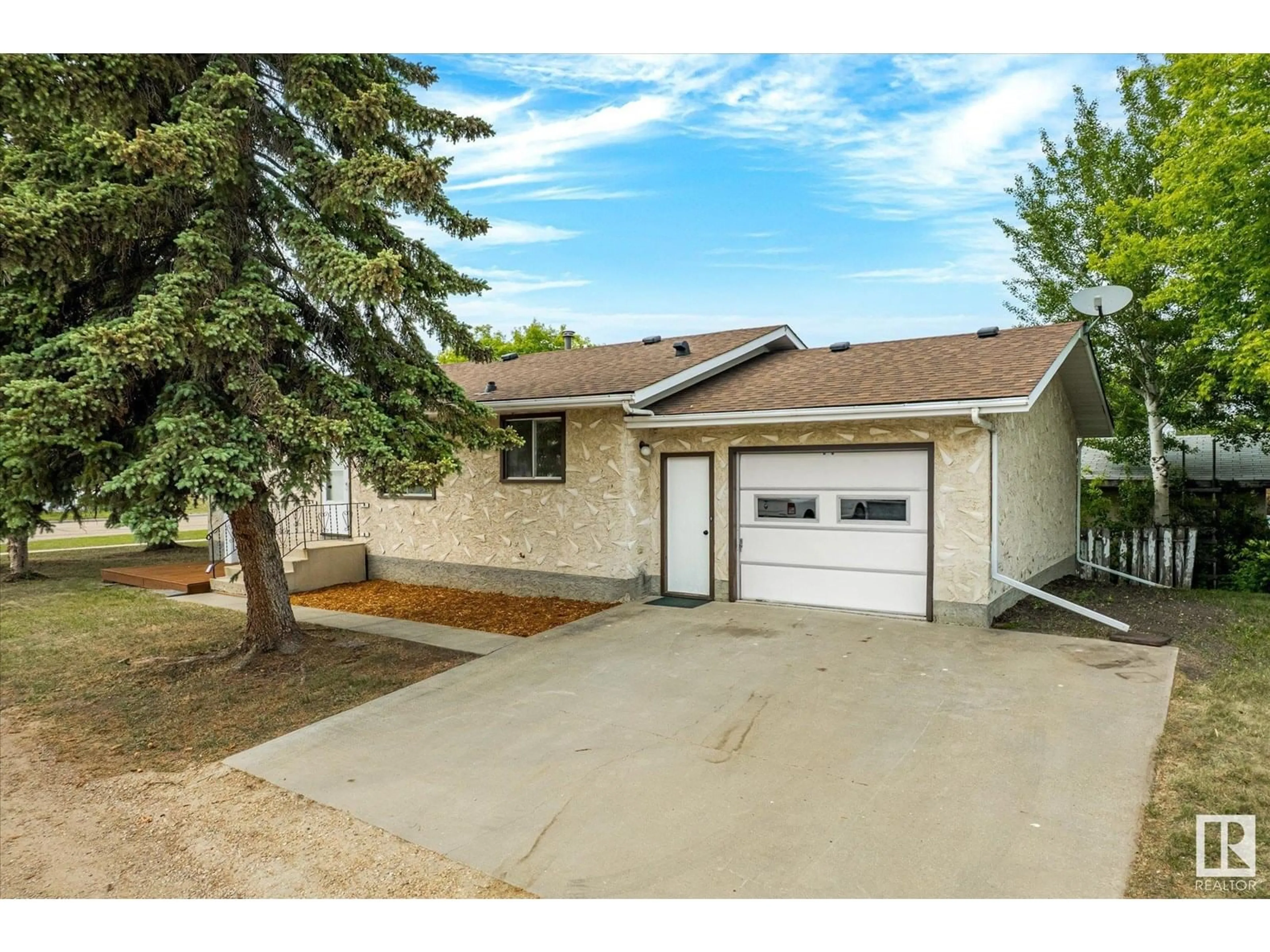 Home with vinyl exterior material, street for 5015 47 ST, Legal Alberta T0G1L0