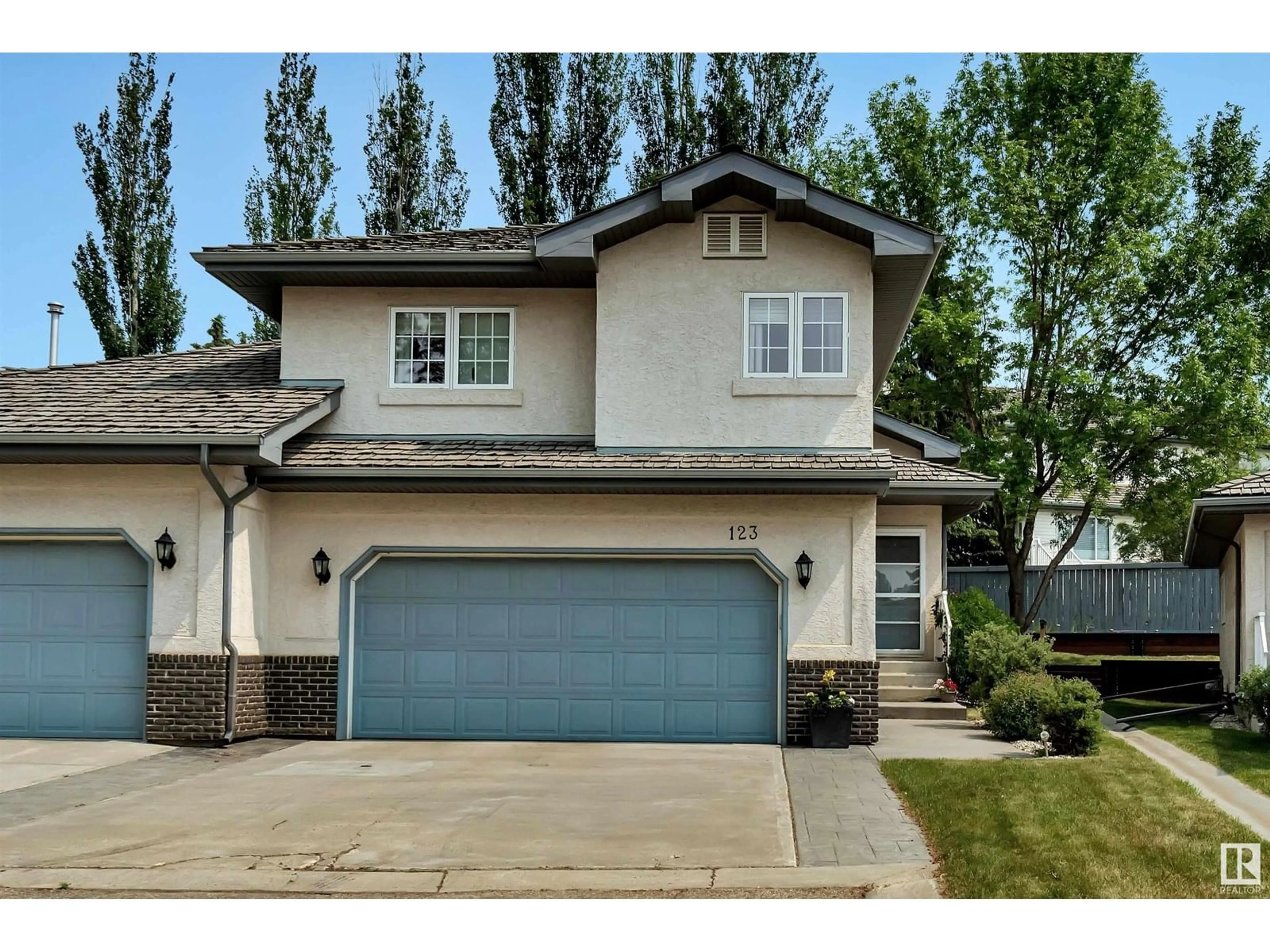 Home with vinyl exterior material, street for 123 215 BLACKBURN E SW, Edmonton Alberta T6W1B9