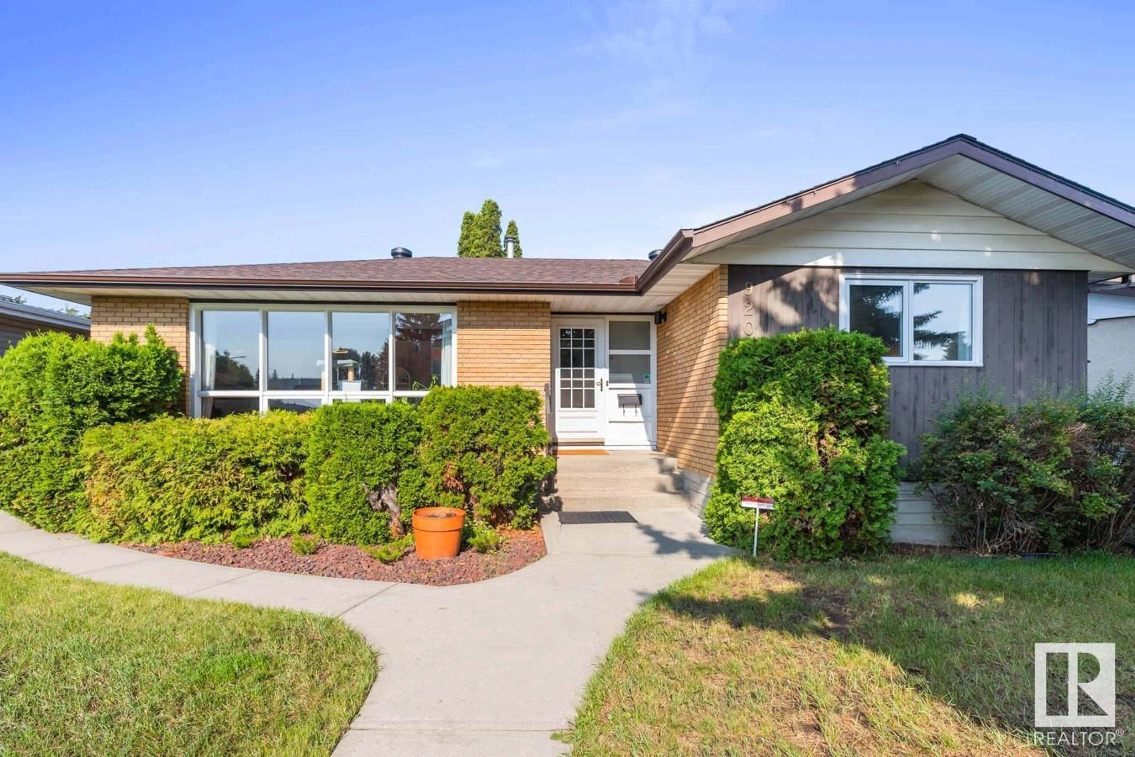 Home with brick exterior material, street for 9208 71 ST, Edmonton Alberta T6B1Y2