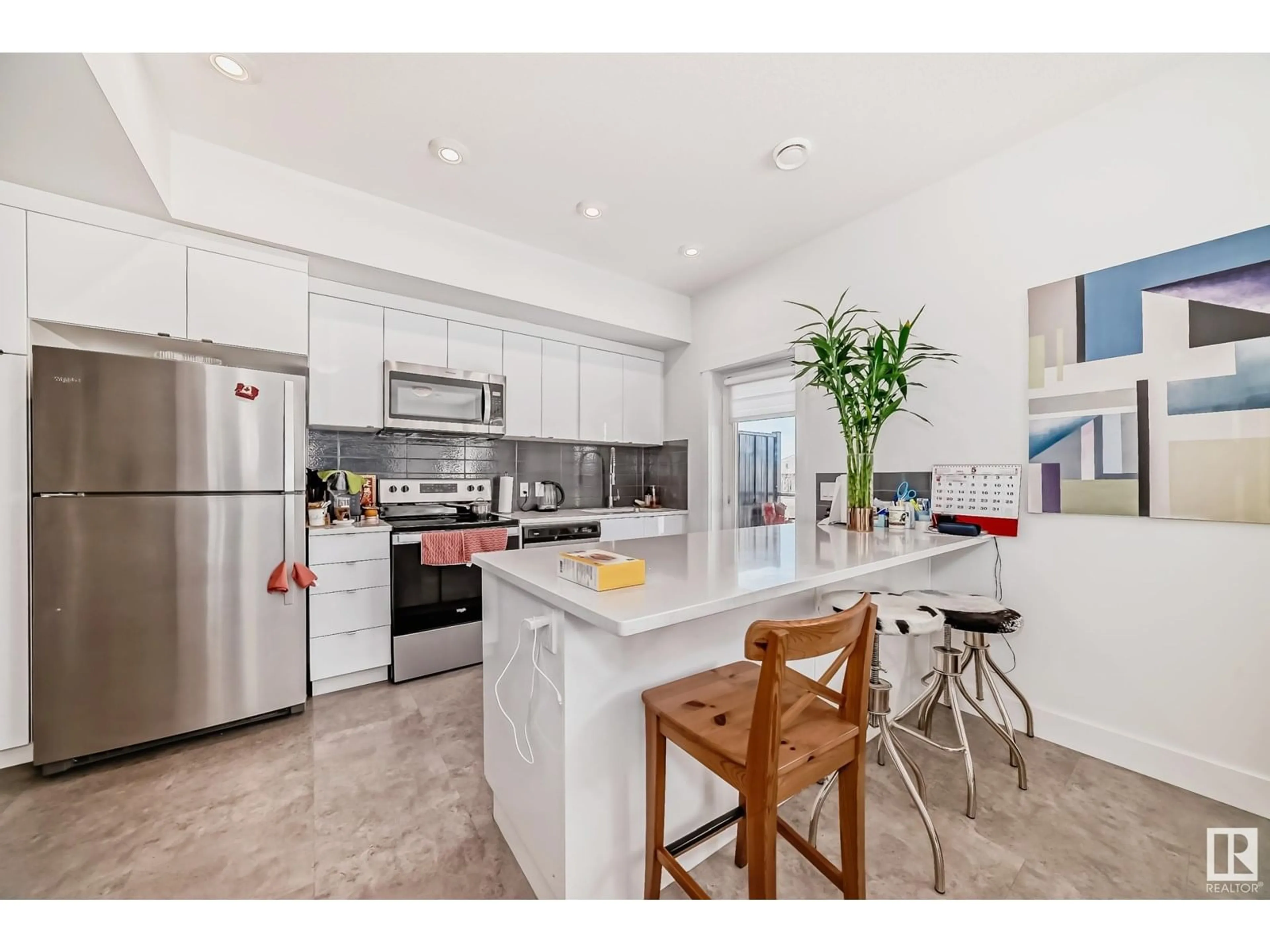 Open concept kitchen, ceramic/tile floor for #22 - 446 ALLARD BV, Edmonton Alberta T6W3S7