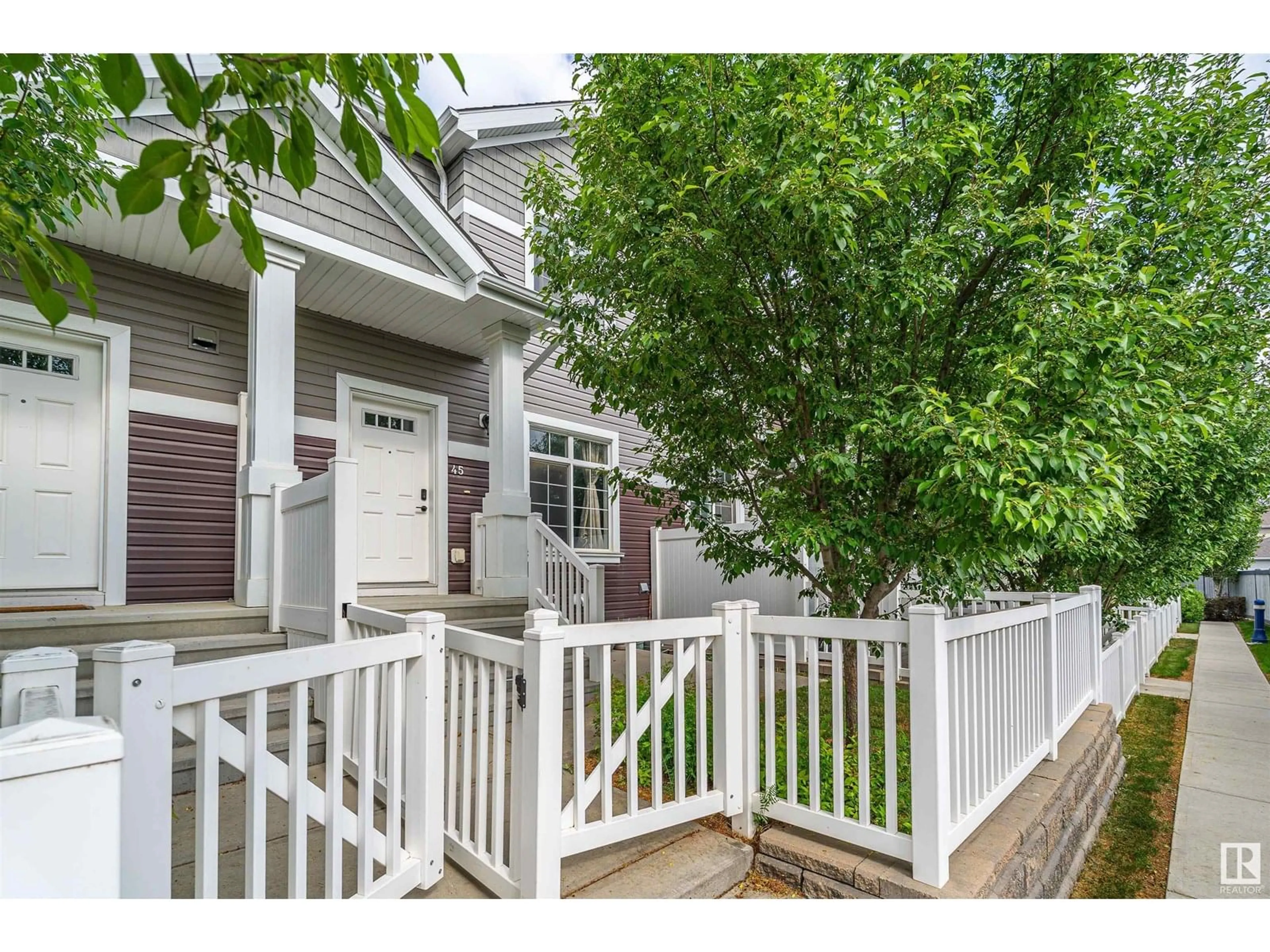 Home with vinyl exterior material, street for #45 - 9151 SHAW WY, Edmonton Alberta T6X1W7