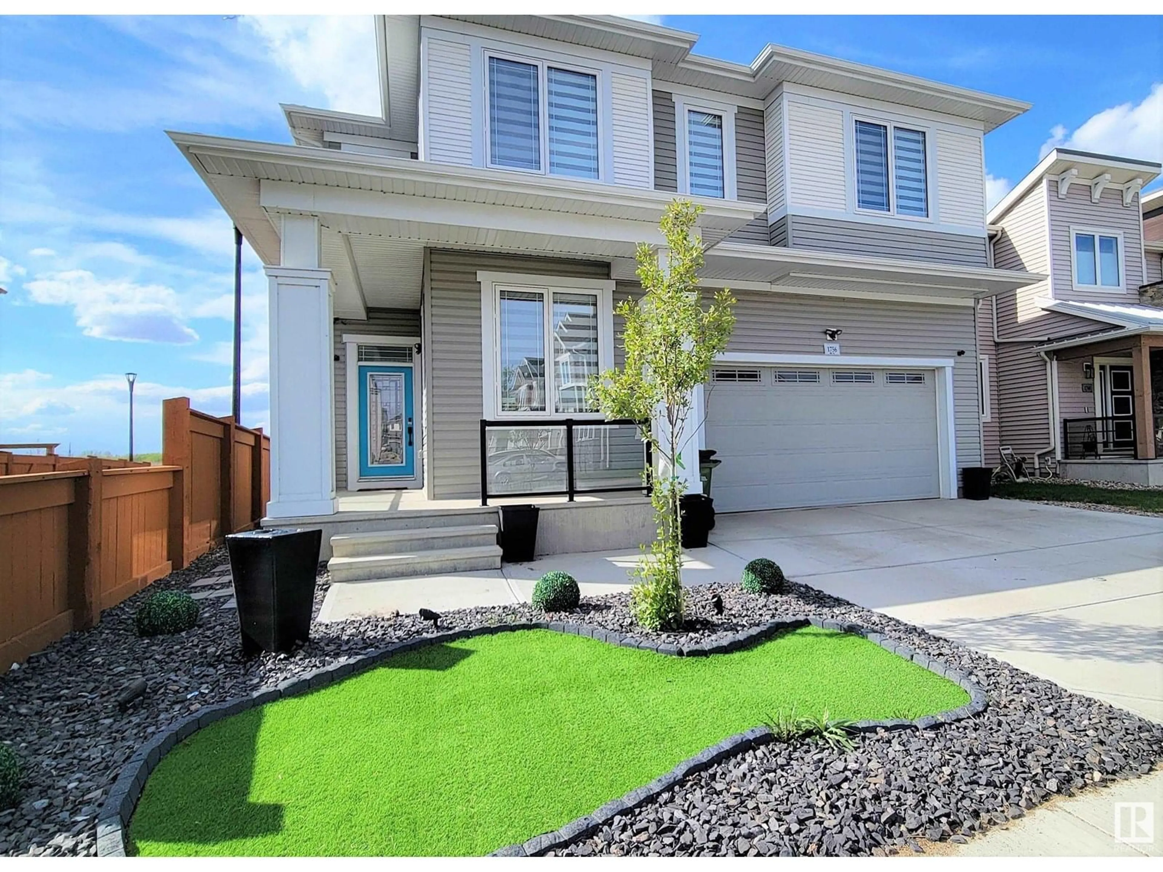 Home with vinyl exterior material, street for 1756 201 ST, Edmonton Alberta T6M0Y1
